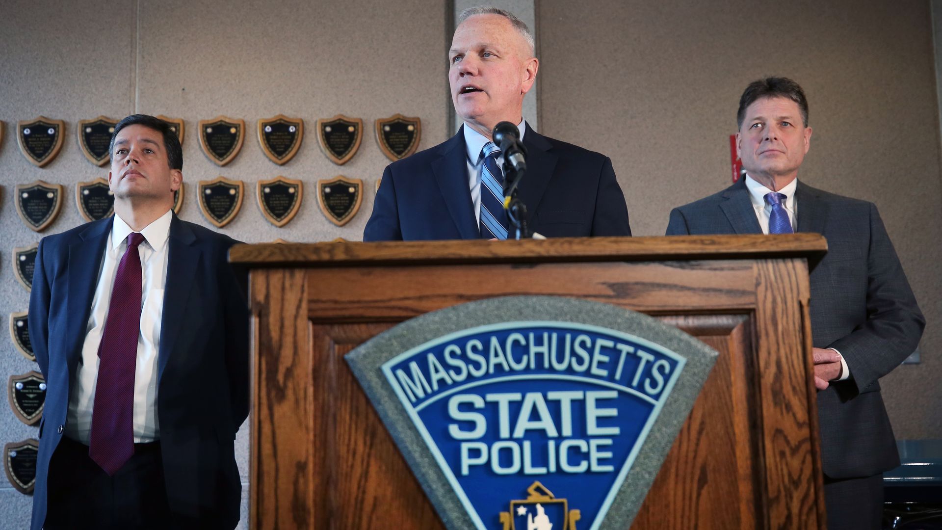 Then-Massachusetts State Police Col. Chris Mason stands at a podium giving an update in 2020 on disciplinary measures against former Troop E members.
