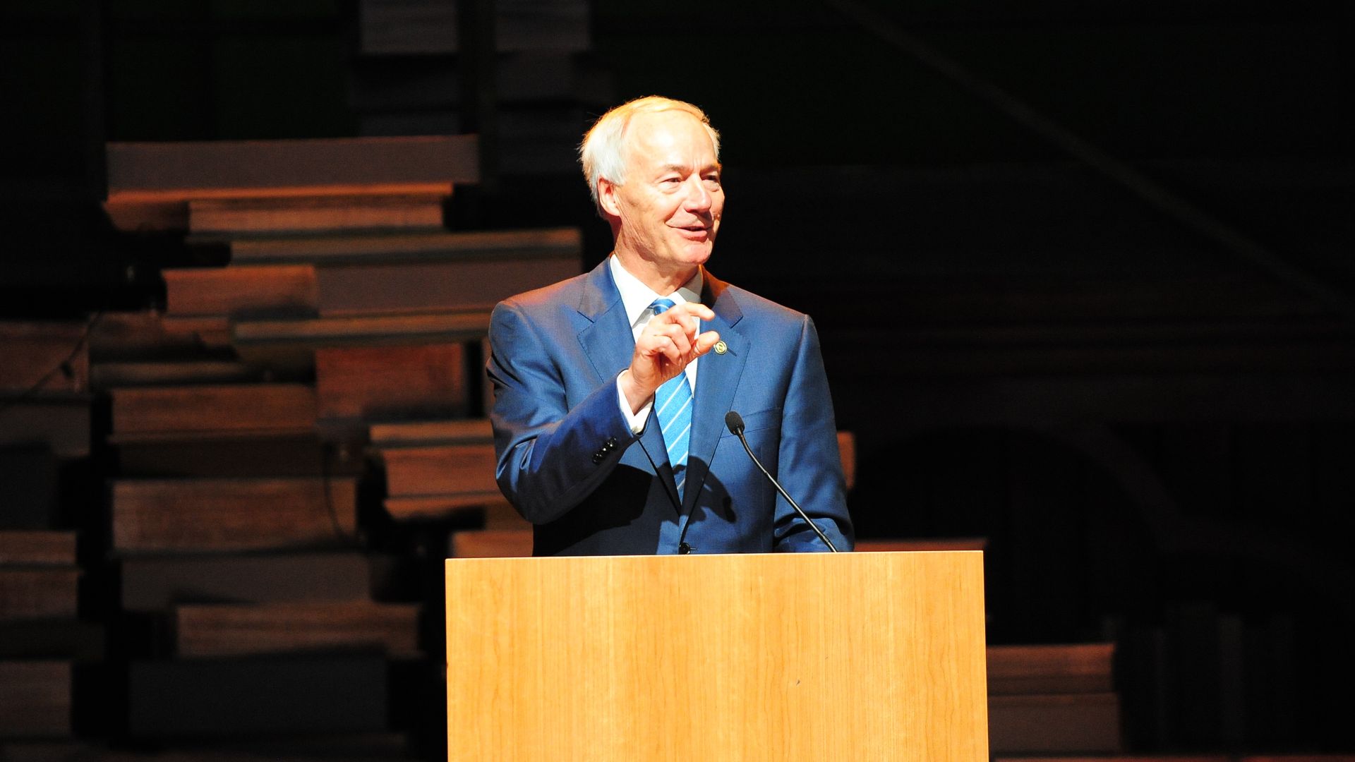 Gov. Asa Hutchinson speaks to a crowd at the NWA Council's annual meeting.