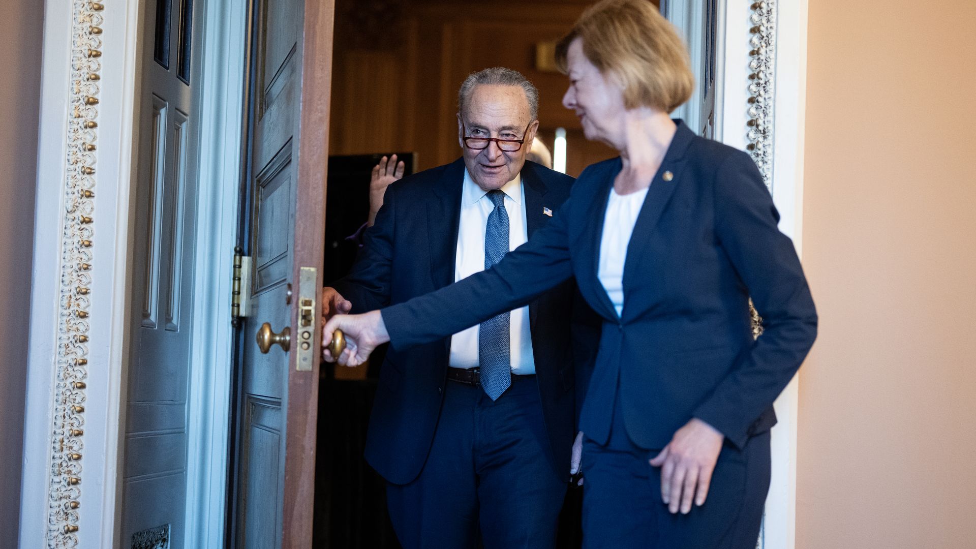 Senate Democratic Leader Charles Schumer, D-N.Y., and Sen. Tammy Baldwin, D-Wis., conference secretary, are seen after being voted into their new positions at the leadership elections in the U.S. Capitol, on Tuesday, December 3, 2024.
