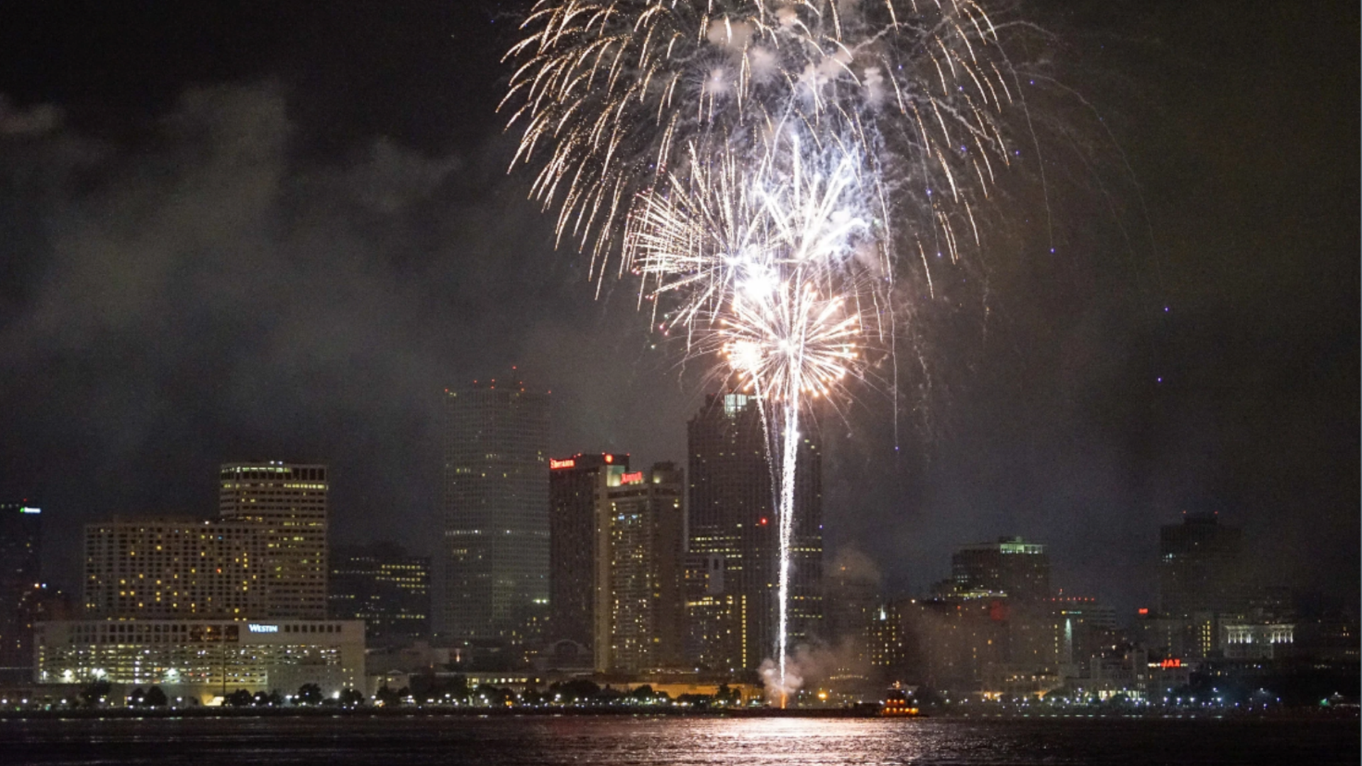 Photos shows fireworks over the New Orleans city skyline for 4th of July.