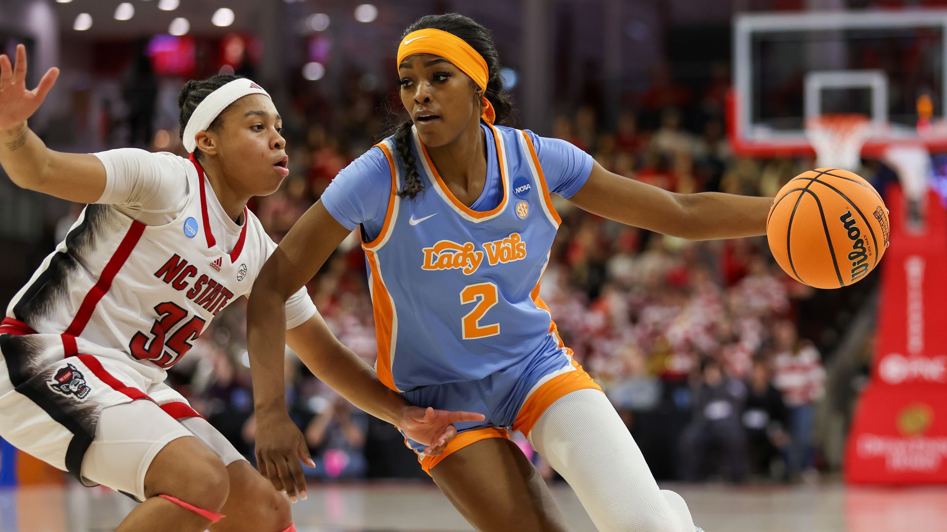 Rickea Jackson #2 of the Tennessee Lady Vols dribbles around Zoe Brooks #35 of the North Carolina State Wolfpack