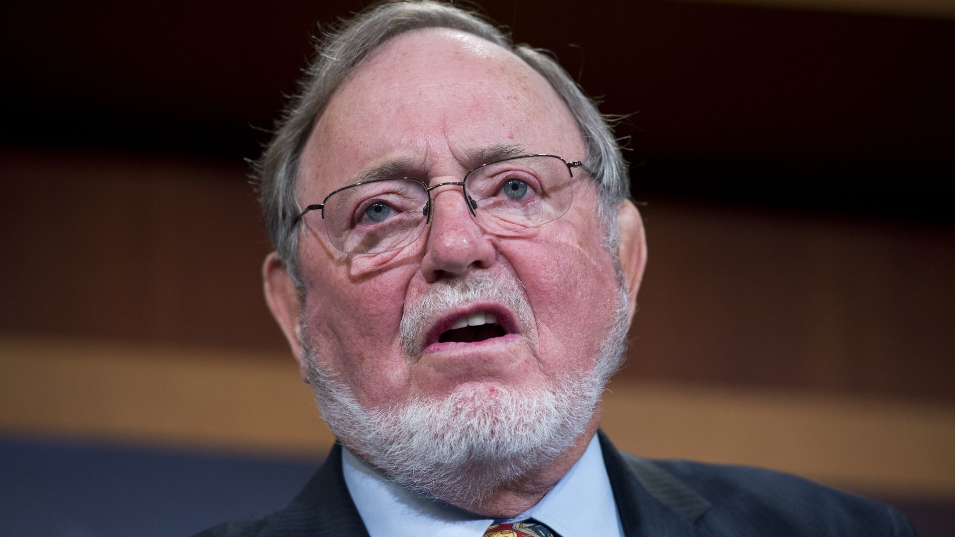 Photo of Don Young wearing glasses and speaking