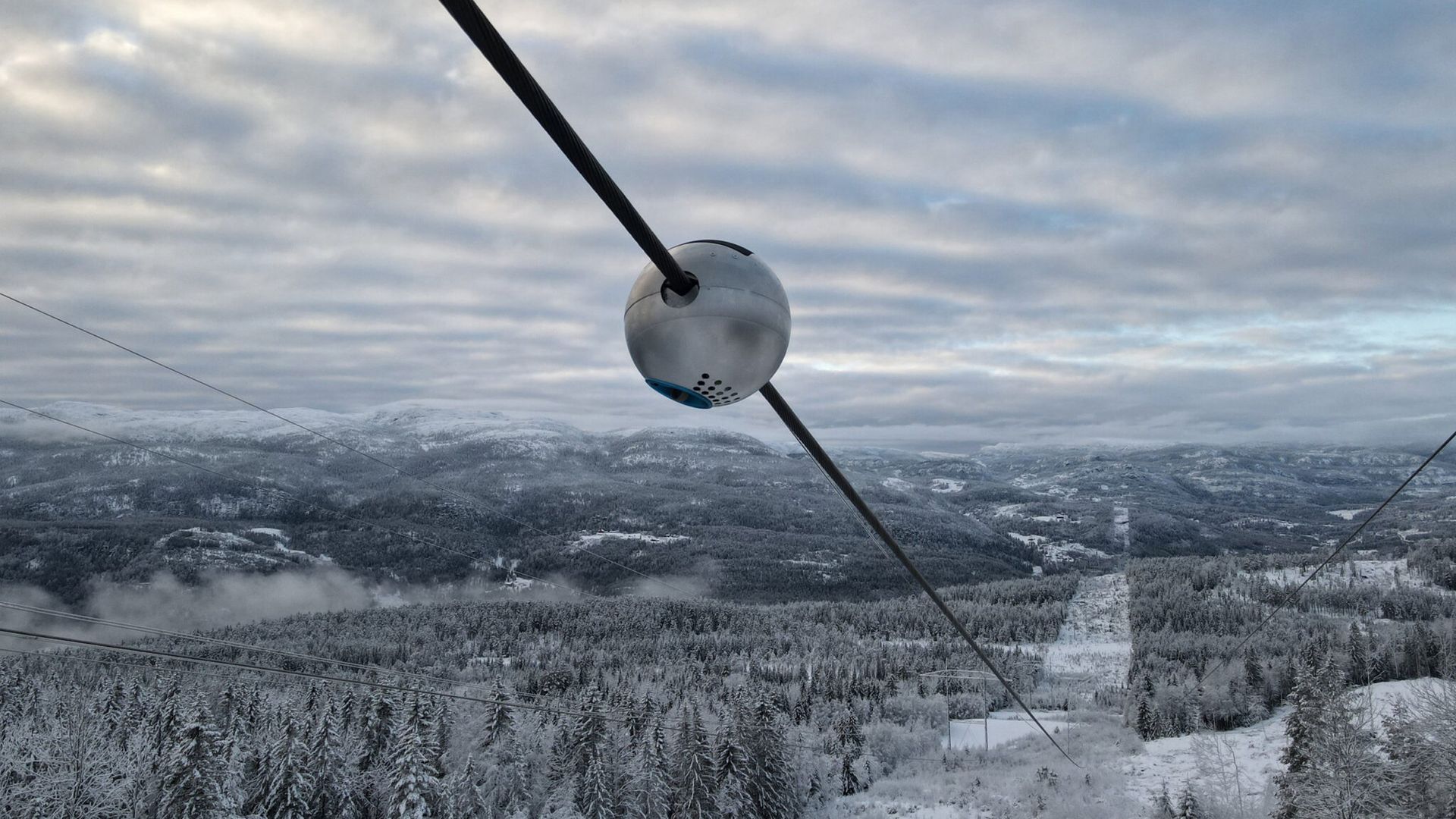 A sensor placed on a power line, made by startup Heimdall Power