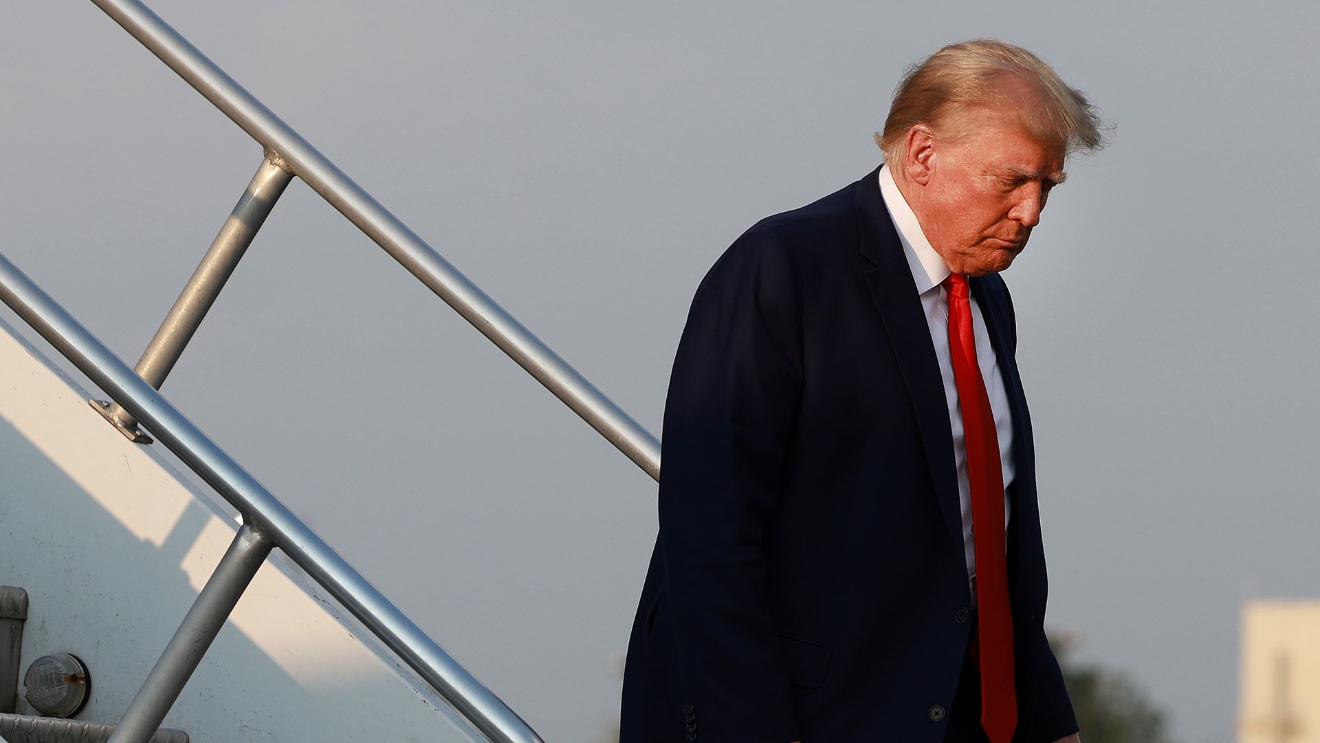 ATLANTA, GEORGIA - AUGUST 24: Former U.S. President Donald Trump arrives at Atlanta Hartsfield-Jackson International Airport on August 24, 2023 in Atlanta, Georgia.