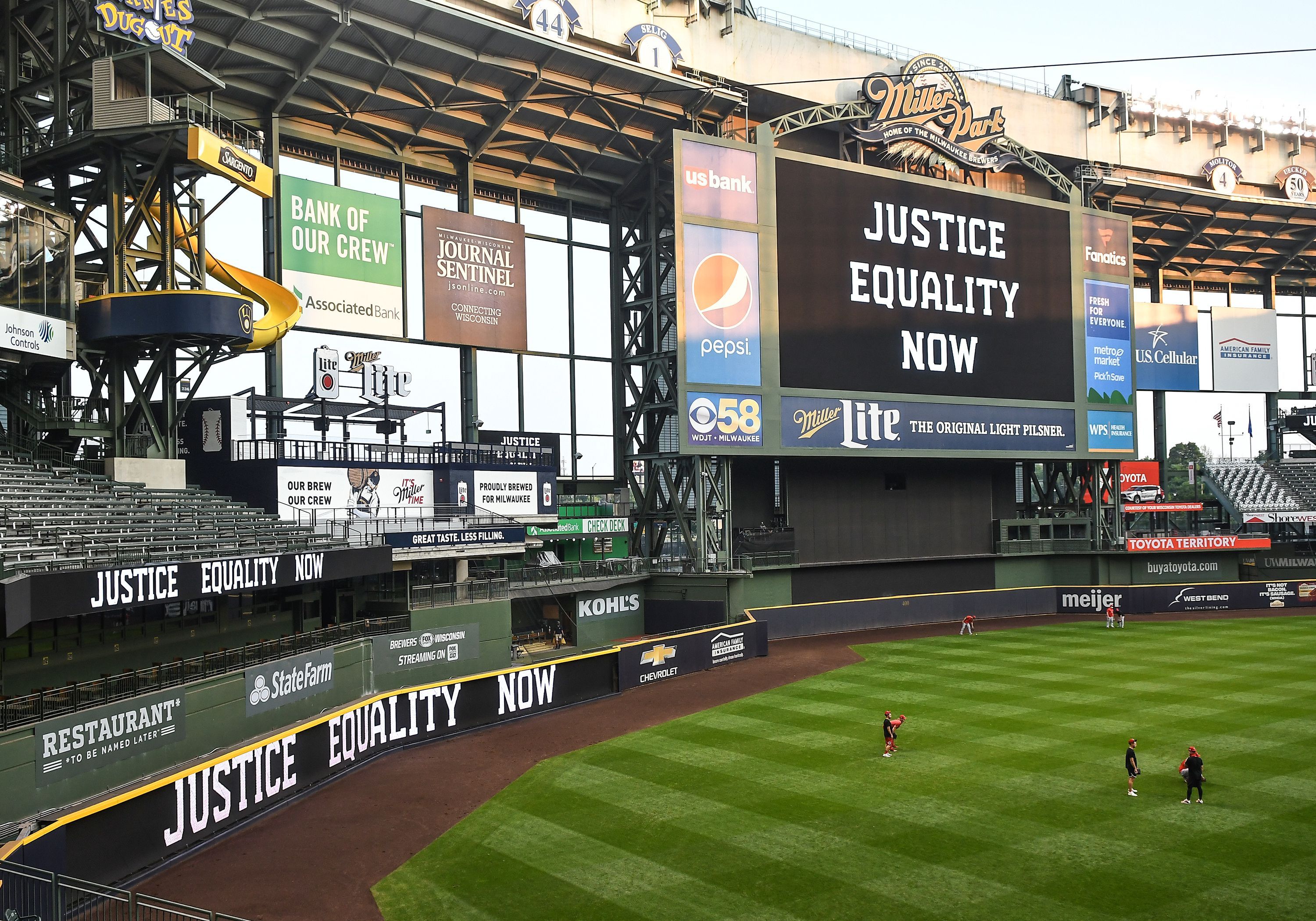 The words "Justice Equality Now" on the jumbotron at Milwaukee's Miller Park.