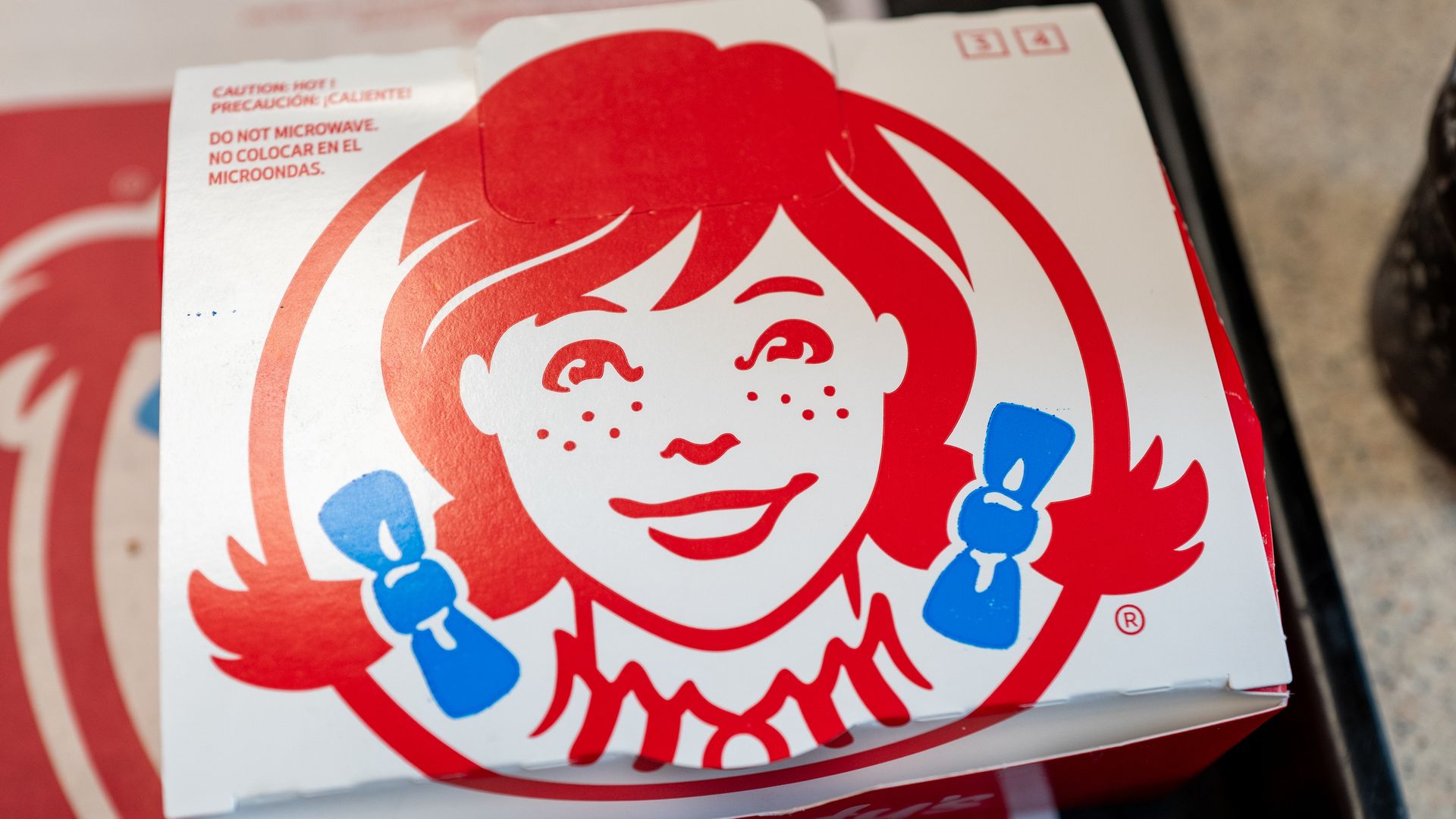 A Wendy's box with the chain's logo 