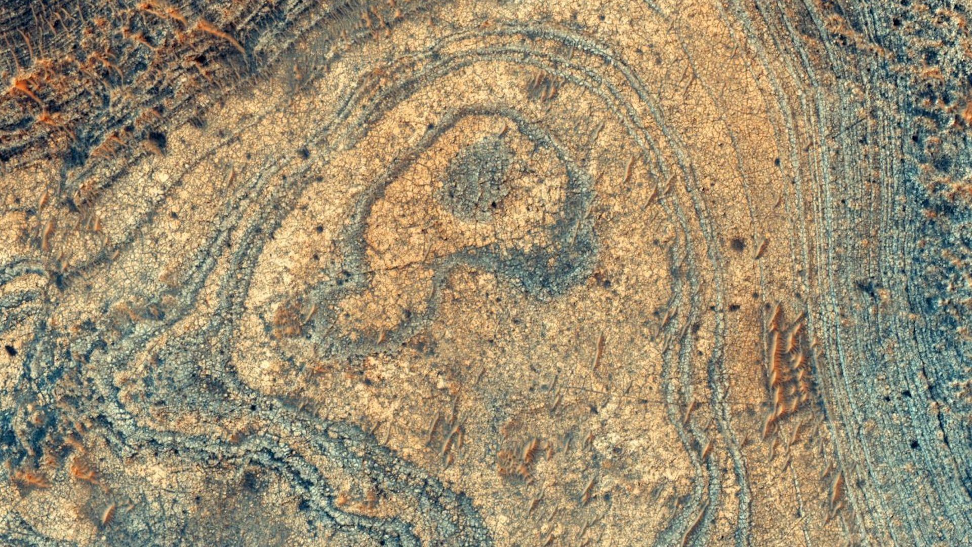 A strange Martian mineral deposit, imaged here from orbit, was likely made by ashfall