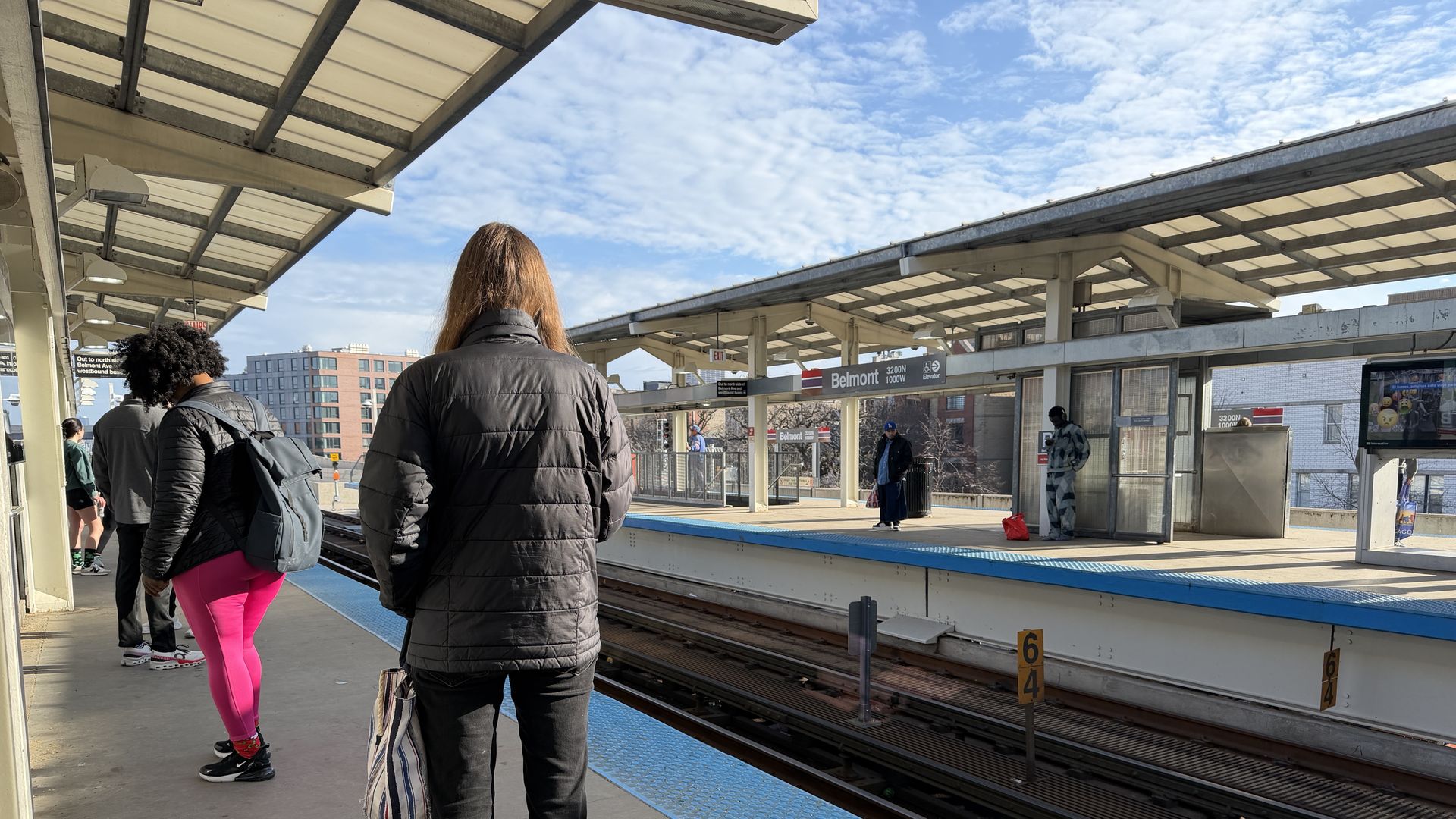 Woman at a trains station