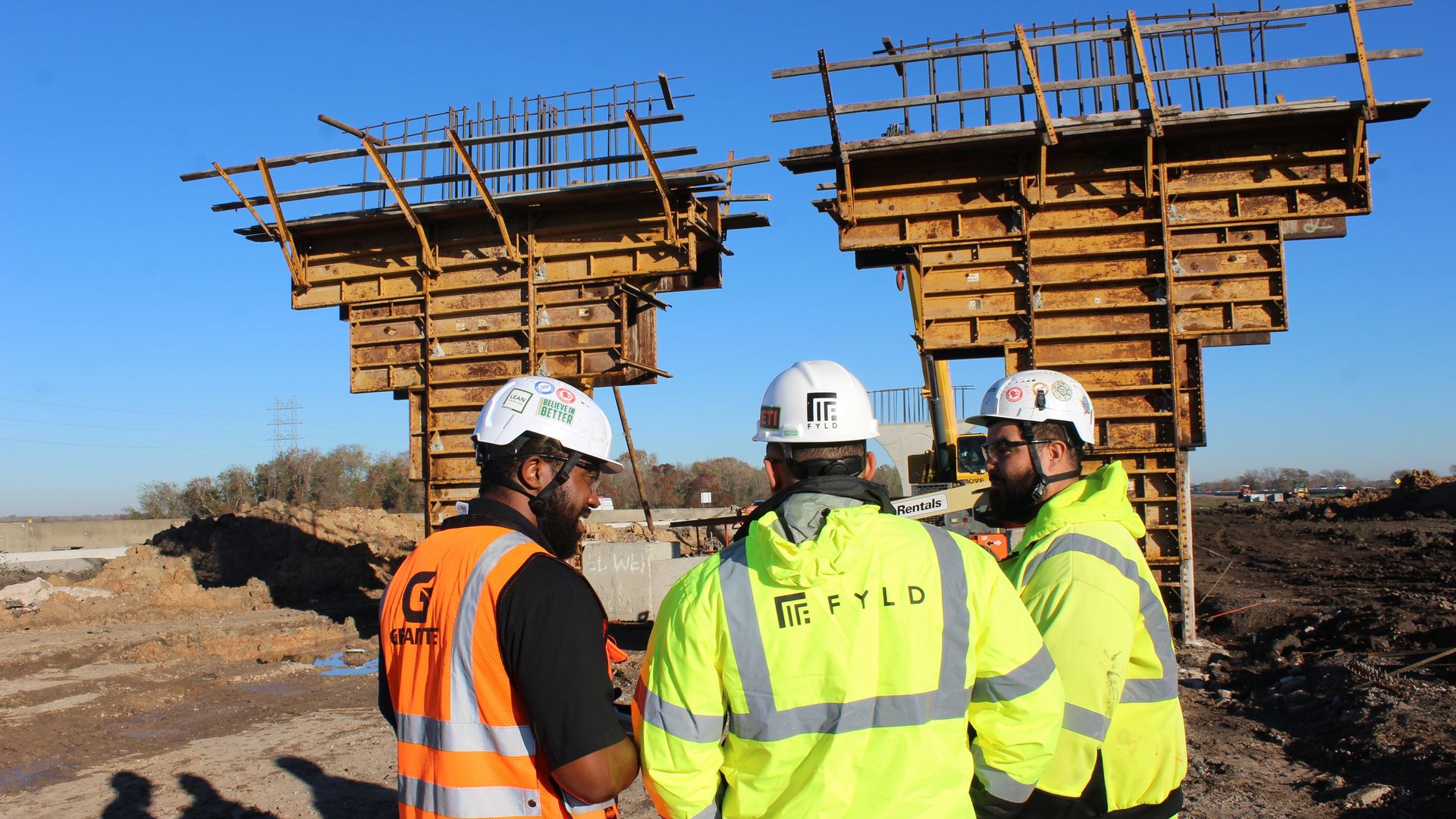 A field worker using Fyld technology at a remote project.