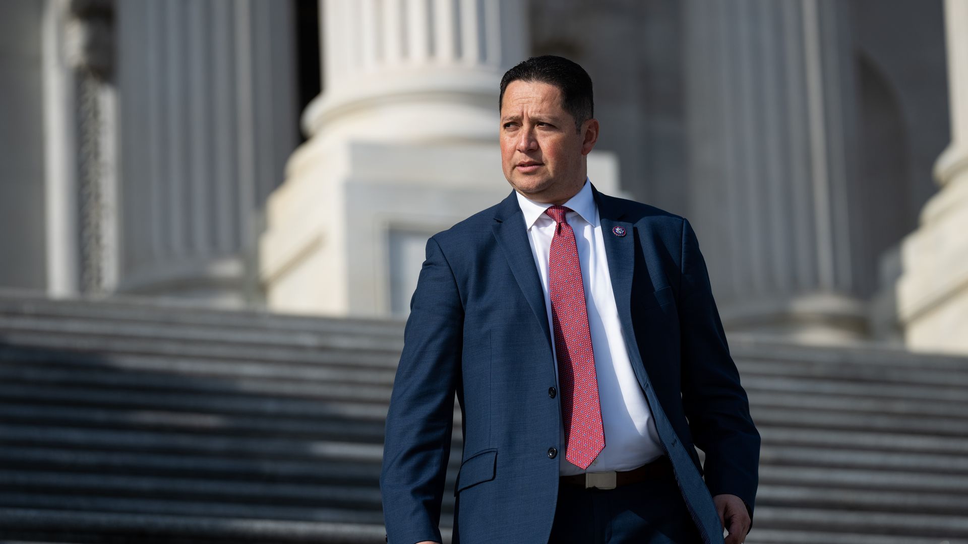 Photo of Tony Gonzales walking down the House steps