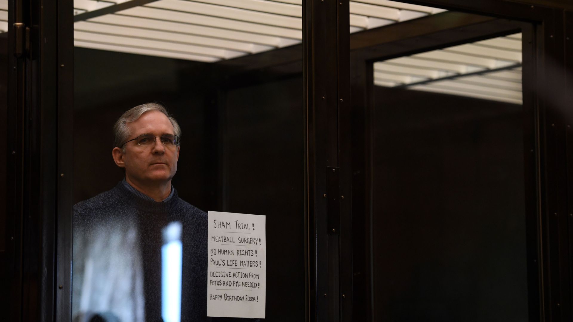 Paul Whelan, a former US marine who has been jailed in Russia since December 2018 on charges of espionage, in a defendants' cage in a Moscow courtroom in June 2020.