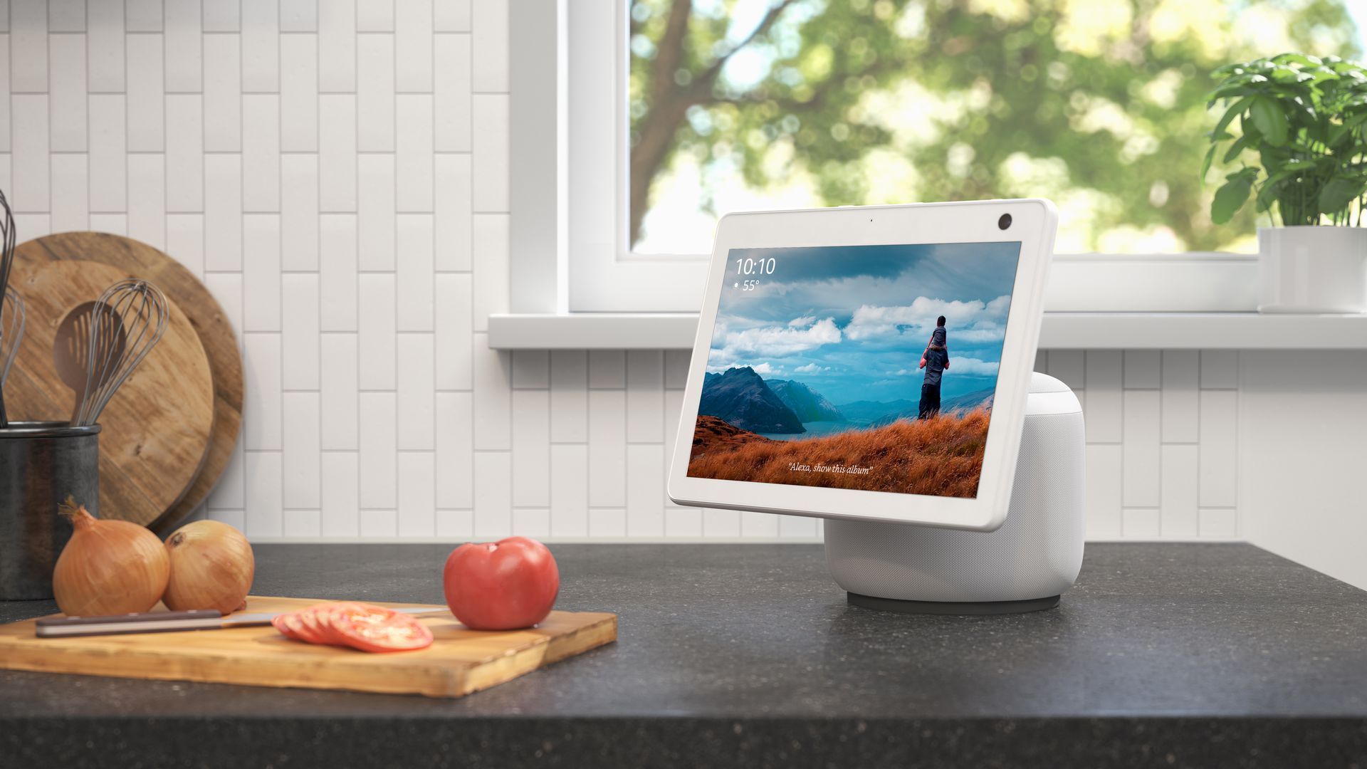 The new Echo Show 10 has a camera and screen that rotate to follow someone as they move around a room. Image: Amazon