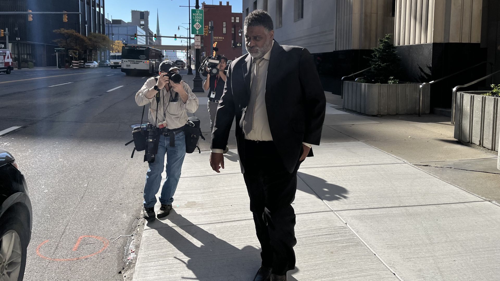 William A. Smith is pictured walking out of the courthouse.