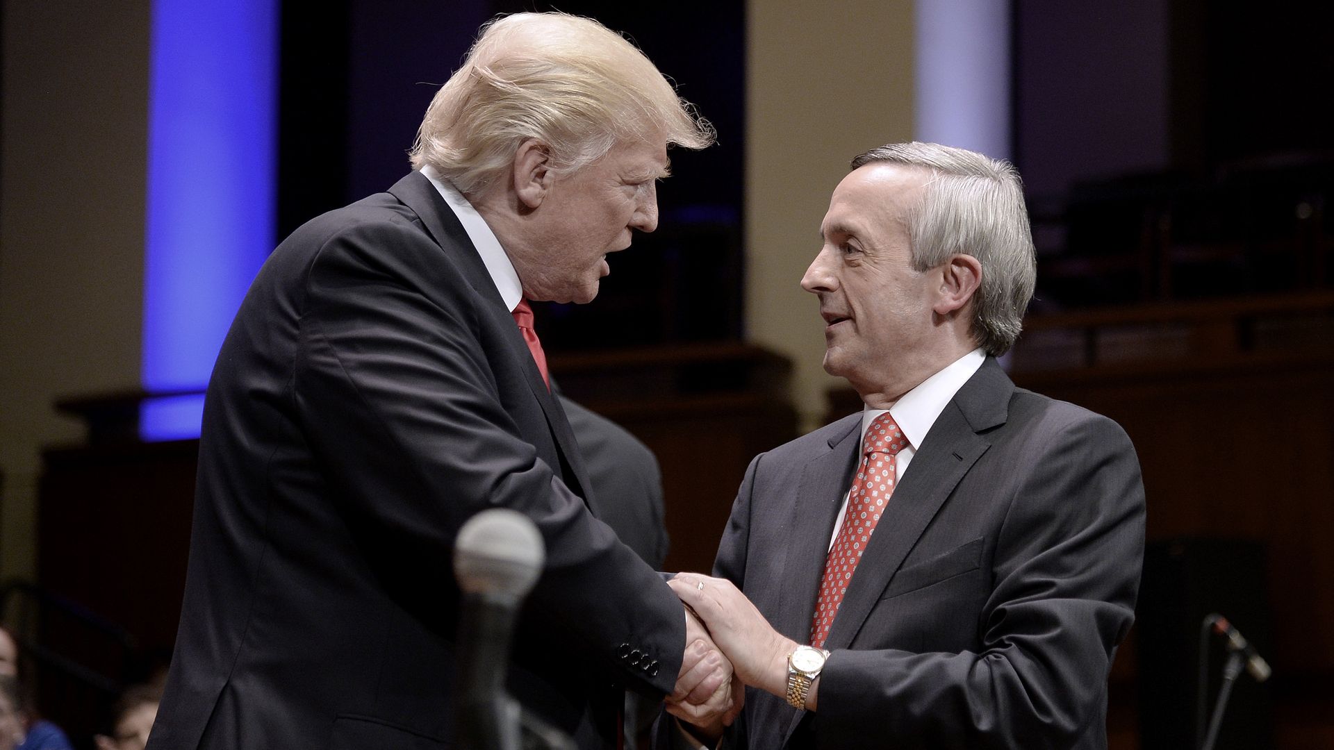 Trump and Jeffress shaking hands