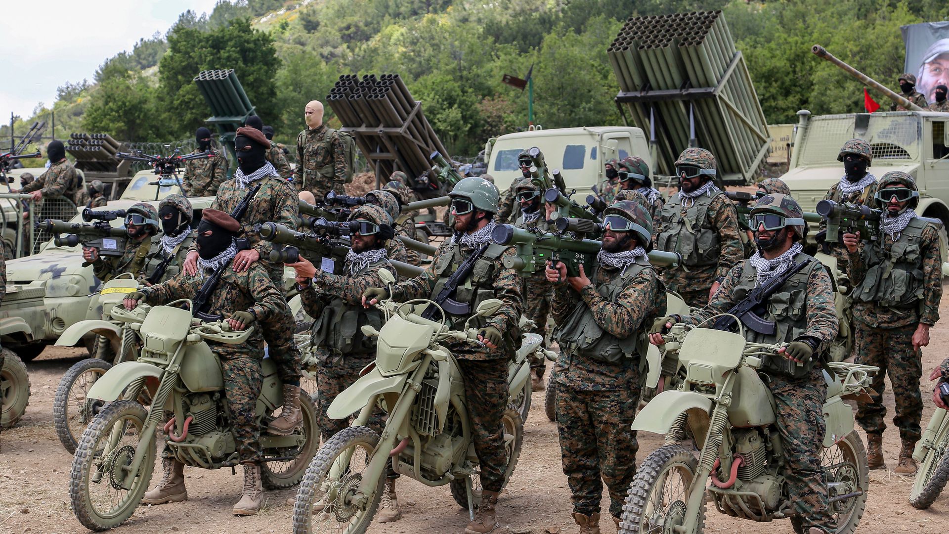  Pro-Iranian Hezbollah fighters take part in a staged military exercise in a camp in the Lebanese southern village of Aramta. Marwan Naamani/picture alliance via Getty Images