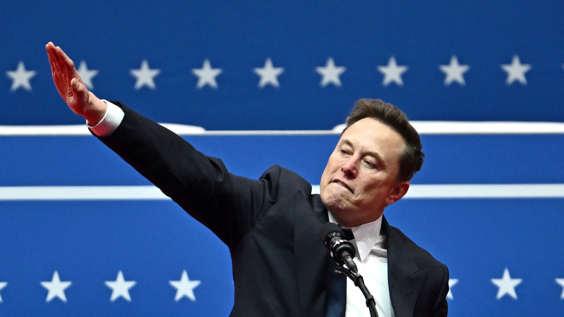 Tesla and SpaceX CEO Elon Musk gives what scholars journalists and rights groups said was a Hitlergru or Nazi salute during the inaugural parade inside Capitol One Arena in Washington DC on January 20 2025