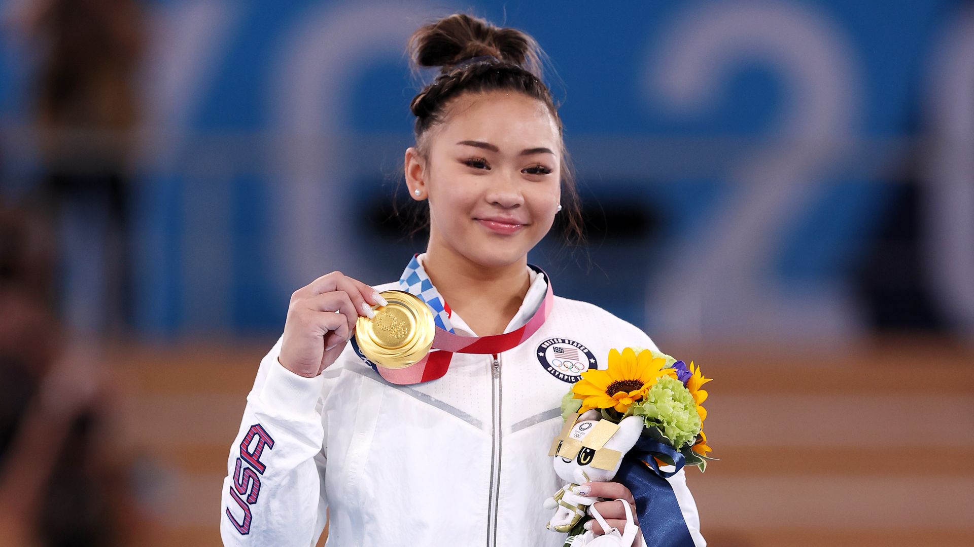 Sunisa Lee of Team USA with her gold medal after winning the Women's All-Around Final at the Tokyo 2020 Olympic Games on July 29, 2021 in Tokyo, Japan.