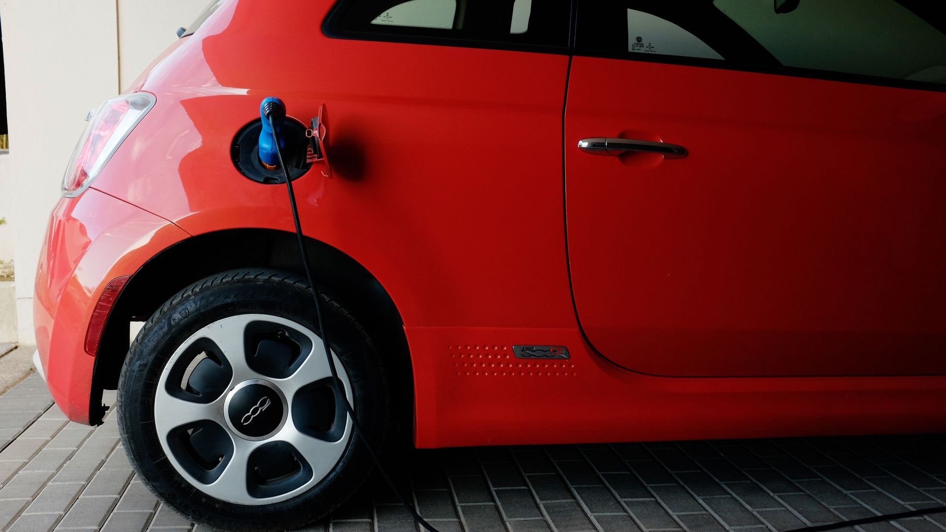 An electric car gets charged in a lot in Costa Rica. Photo: Mirieth Abrego/AFP via Getty Images