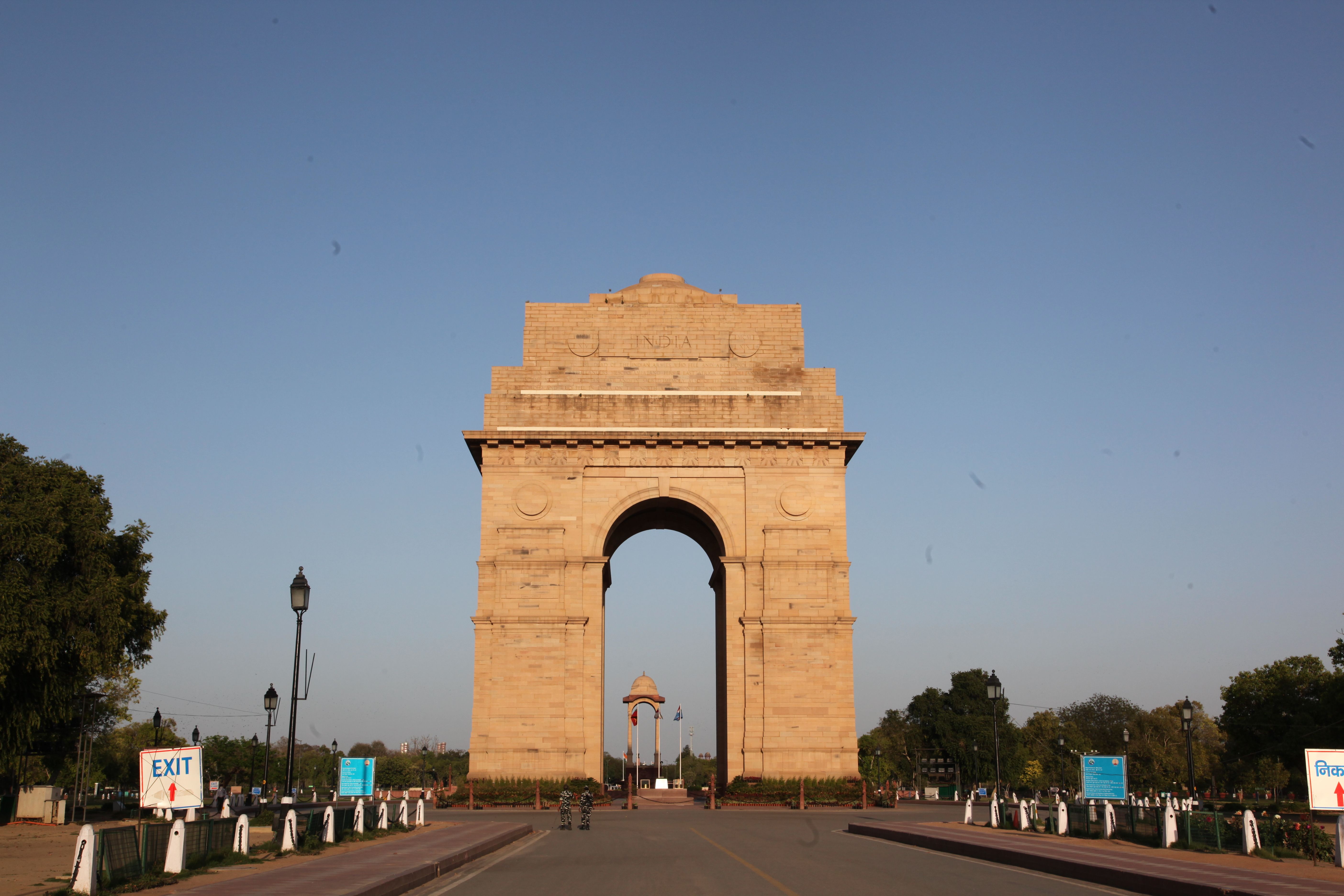 The India Gate surrounded by blue skies