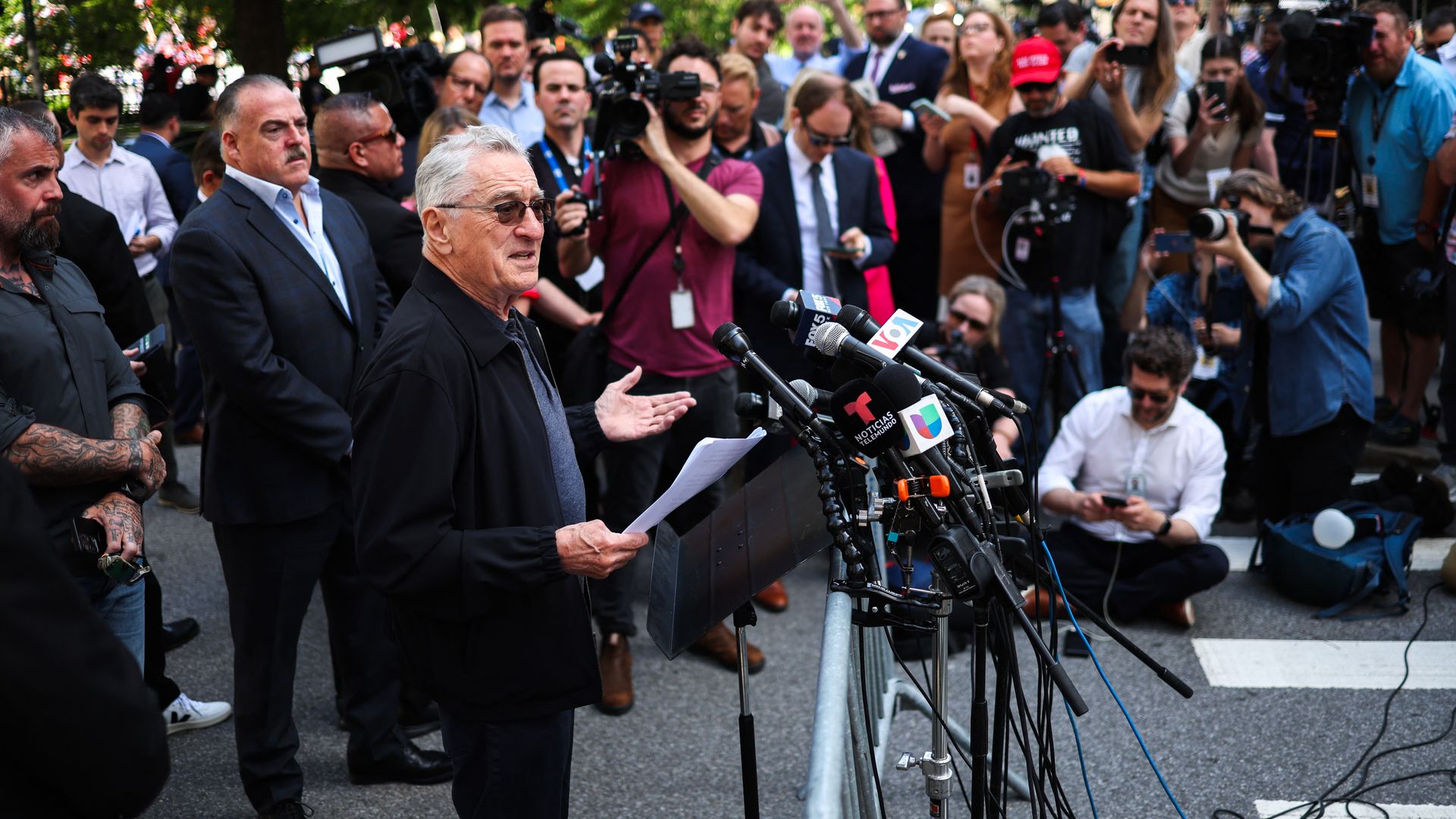 US actor Robert De Niro speaks in support of US President Joe Biden outside of Manhattan Criminal Co