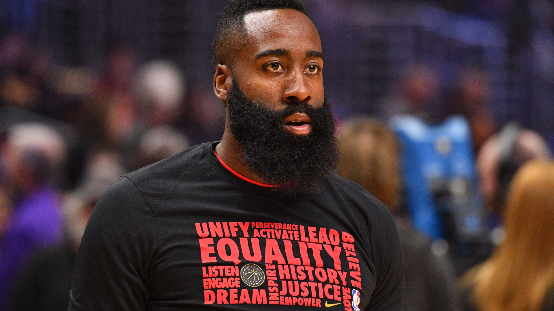 Houston Rockets Guard James Harden (13), wearing a Black History Month t-shirt,