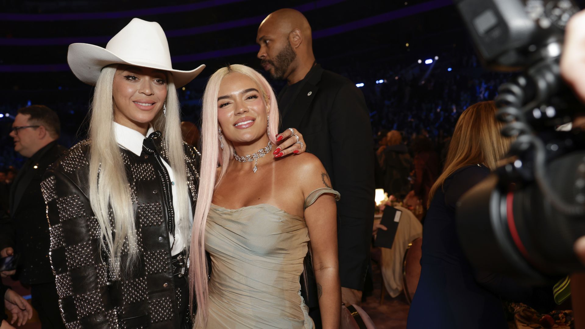 Beyoncé, Karol G behind the scenes at The 66th Annual Grammy Awards, airing live from Crypto.com Arena in Los Angeles, California, Sunday, Feb. 4 (8:00-11:30 PM, live ET/5:00-8:30 PM, live PT) on the CBS Television Network.