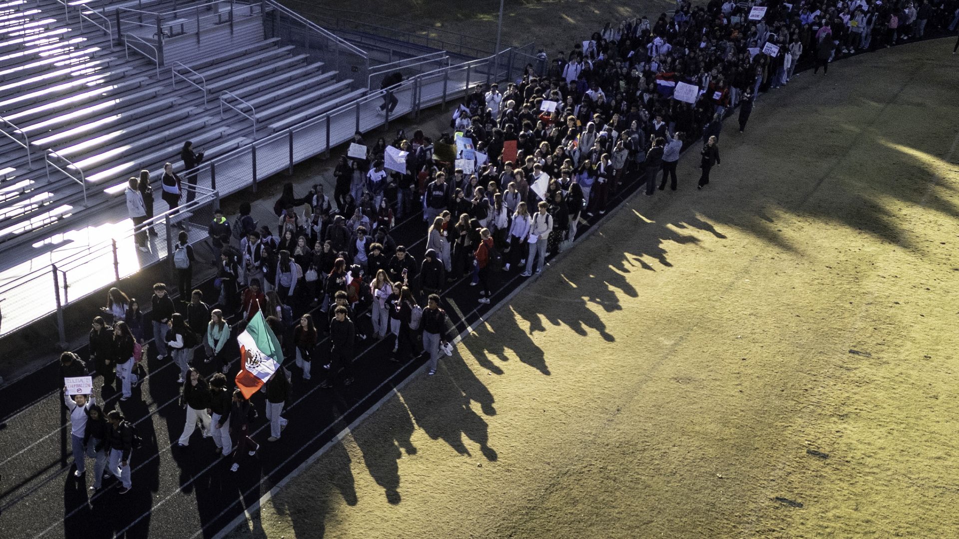 In an aerial view, students stage a walkout at East Mecklenburg High School in protest of U.S.Border Patrol operations targeting undocumented immigrants on November 18, 2025 in Charlotte, North Carolina. 