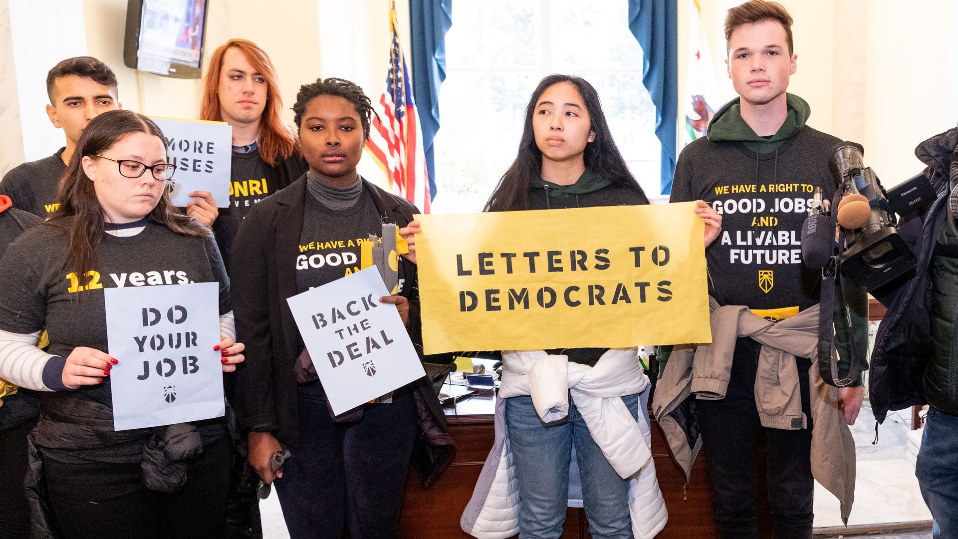Protestors who want green new deal