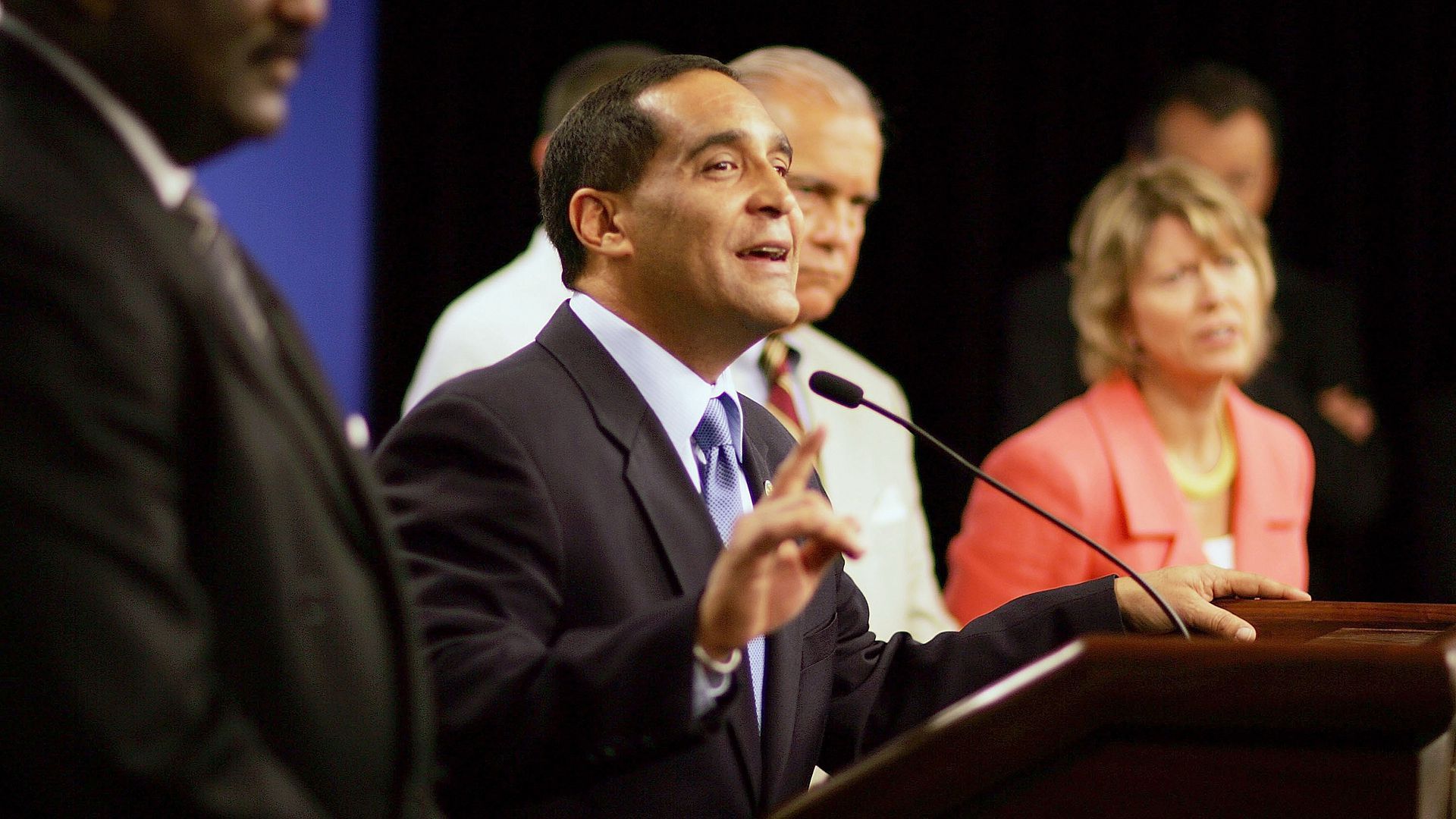Joe Martinez surrounded by other Miami-Dade commissioners and county officials at a press conference on July 28, 2006.