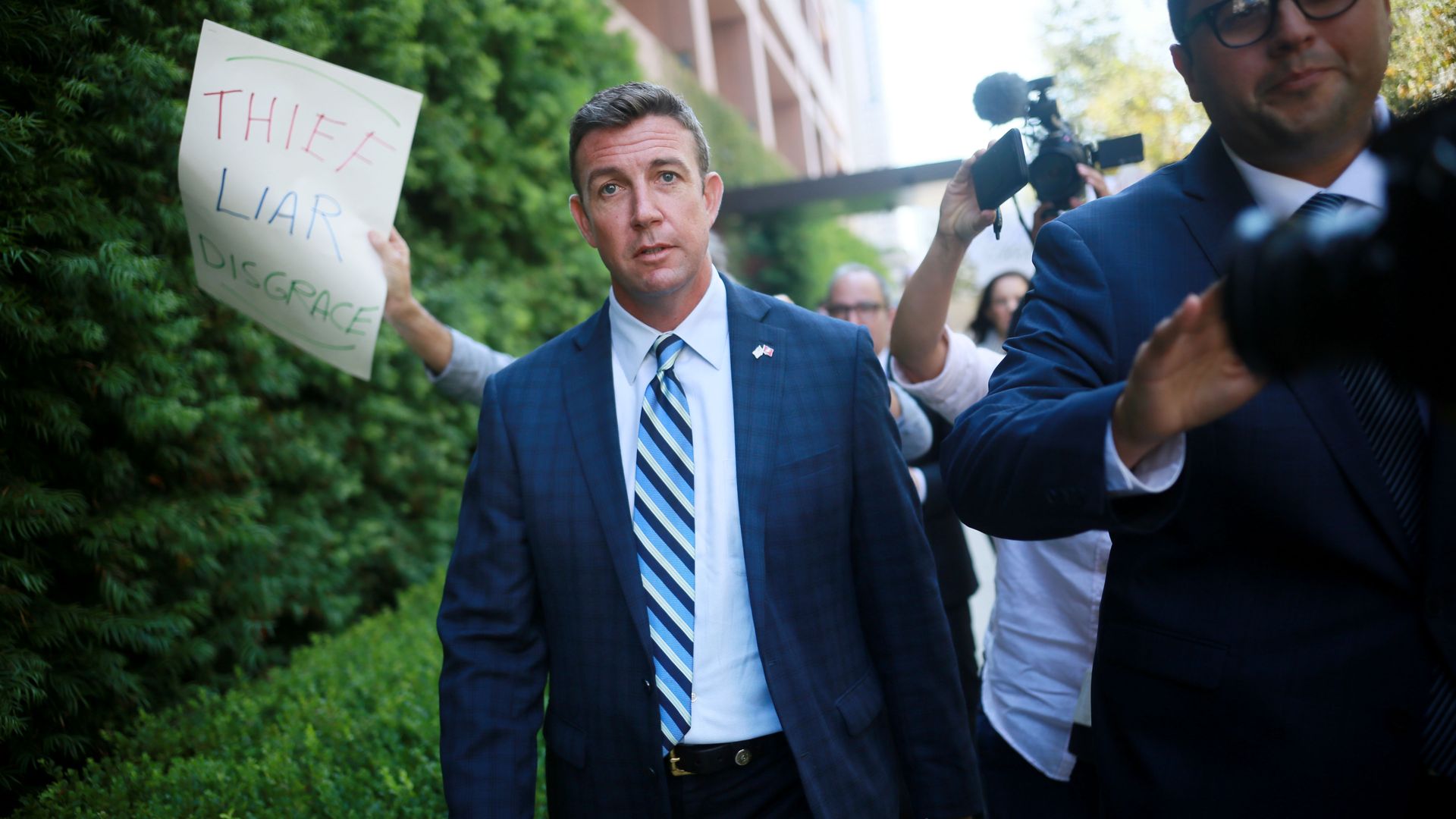 Congressman Duncan Hunter walks out of the San Diego Federal Courthouse after an arraignment hearing Thursday. Photo: Sandy Huffaker/Getty Images