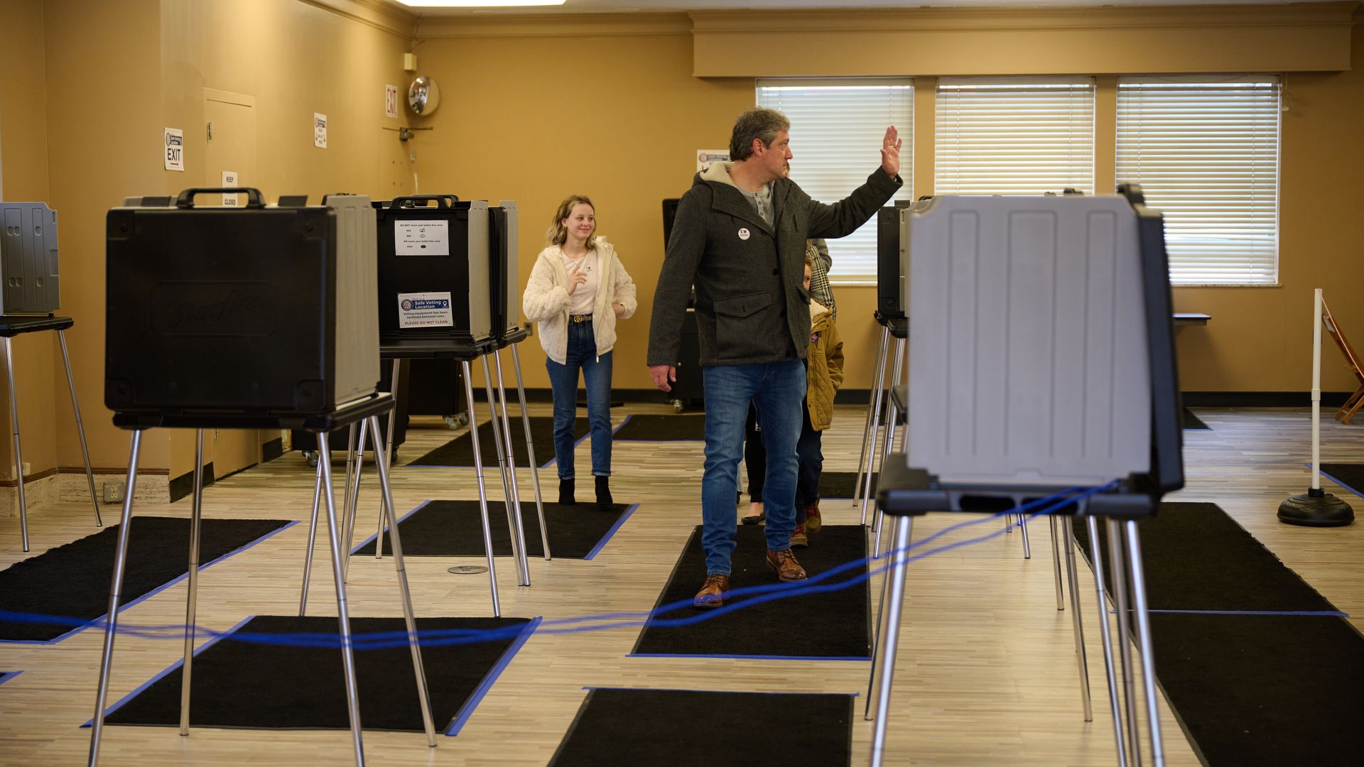 Rep. Tim Ryan (D-Ohio), a candidate for Senate, waves goodbye to poll workers after early-voting