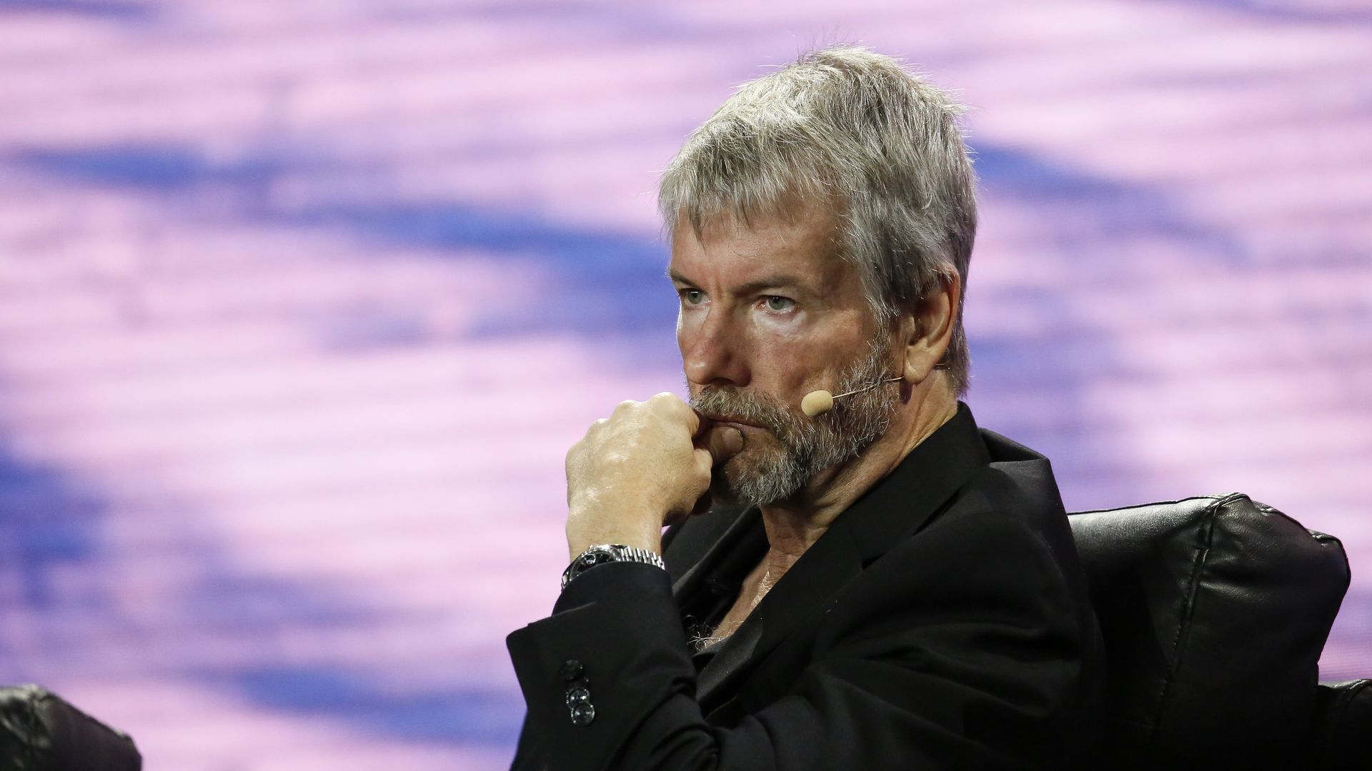 Michael Saylor, cofounder and chair of MicroStrategy, pauses and puts his hand to his chin.