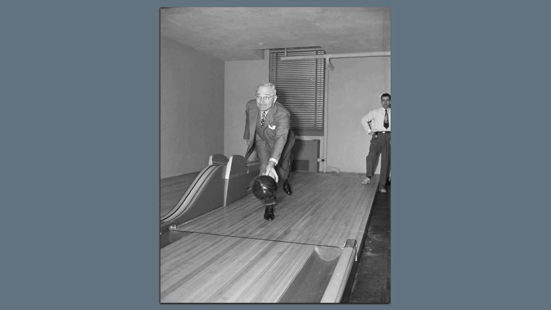 President Truman at the original White House Bowling Alley