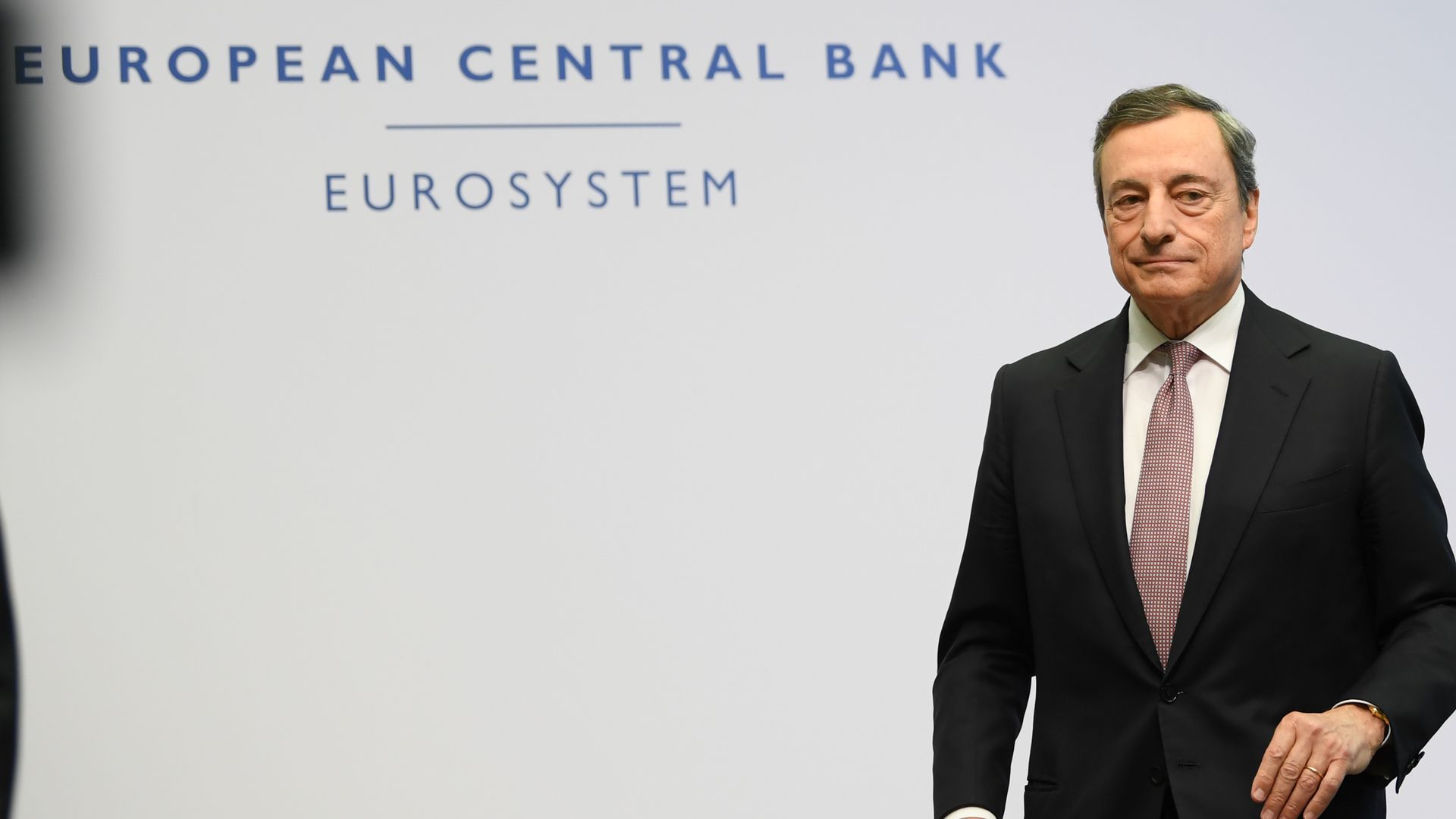 Mario Draghi leaves a panel following the press conference at the ECB's headquarters
