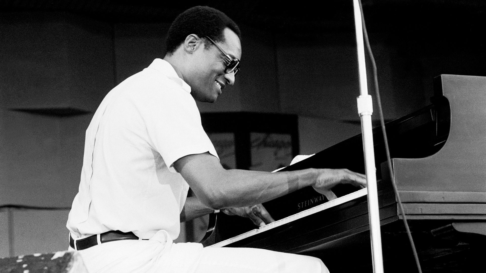 Photo of a pianist playing on stage.