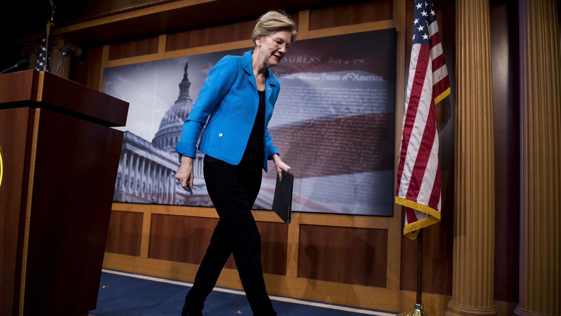  Sen. Elizabeth Warren, D-Mass., walks away form the podium after holding a news conference