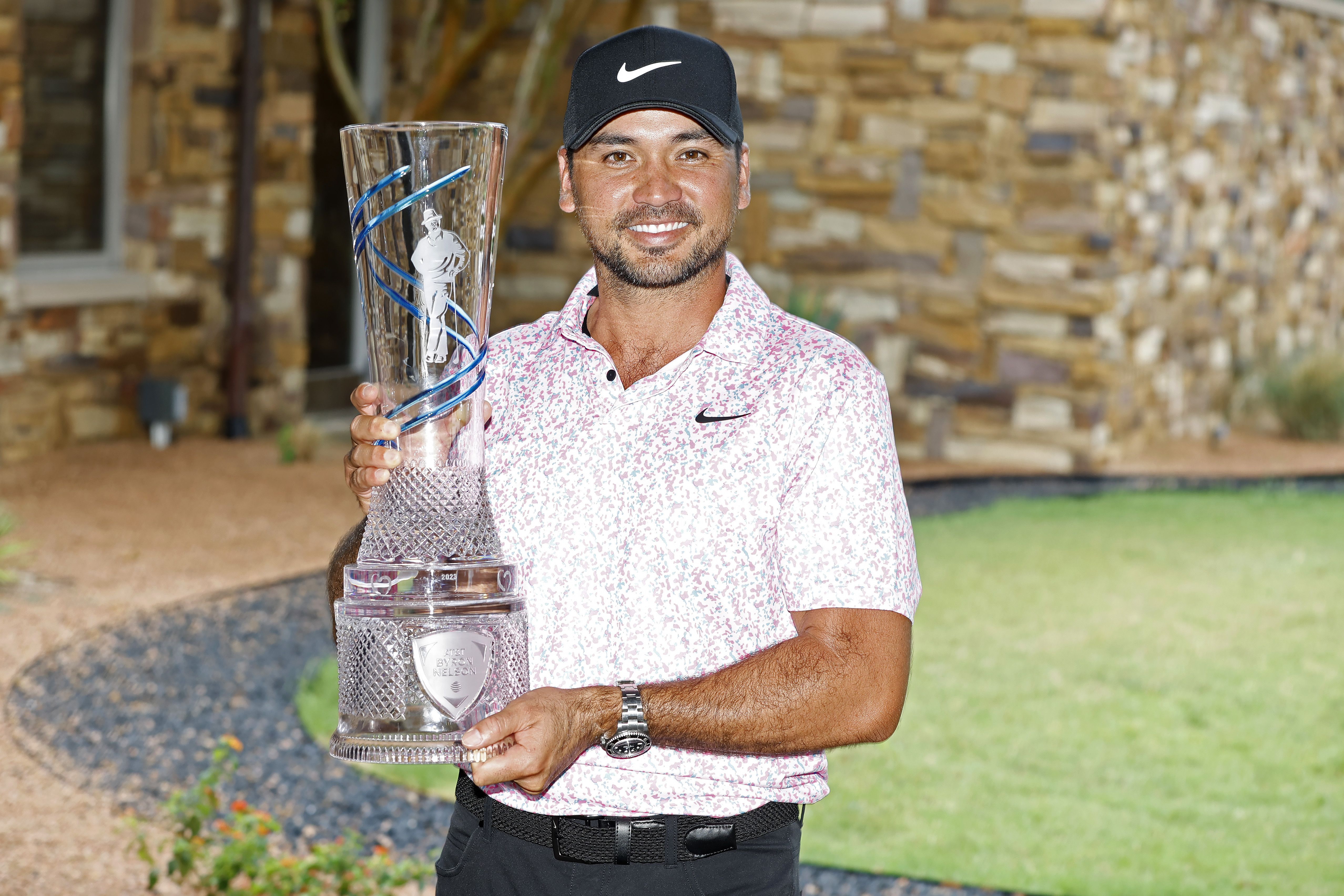 jason day holding trophy