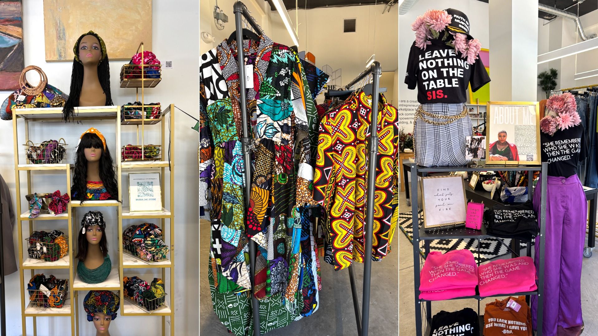 Colorful fashion store display: left shelves with wigs and bags, mannequins with bright headpieces, central rack of vibrant patterned fabrics, right display with a black tee reading "LEAVE NOTHING ON THE TABLE SIS." and a pink flower garland.