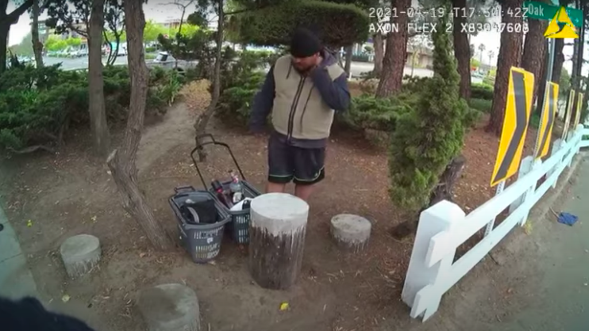 Mario Arenales Gonzalez stands in a park, as seen on body camera footage