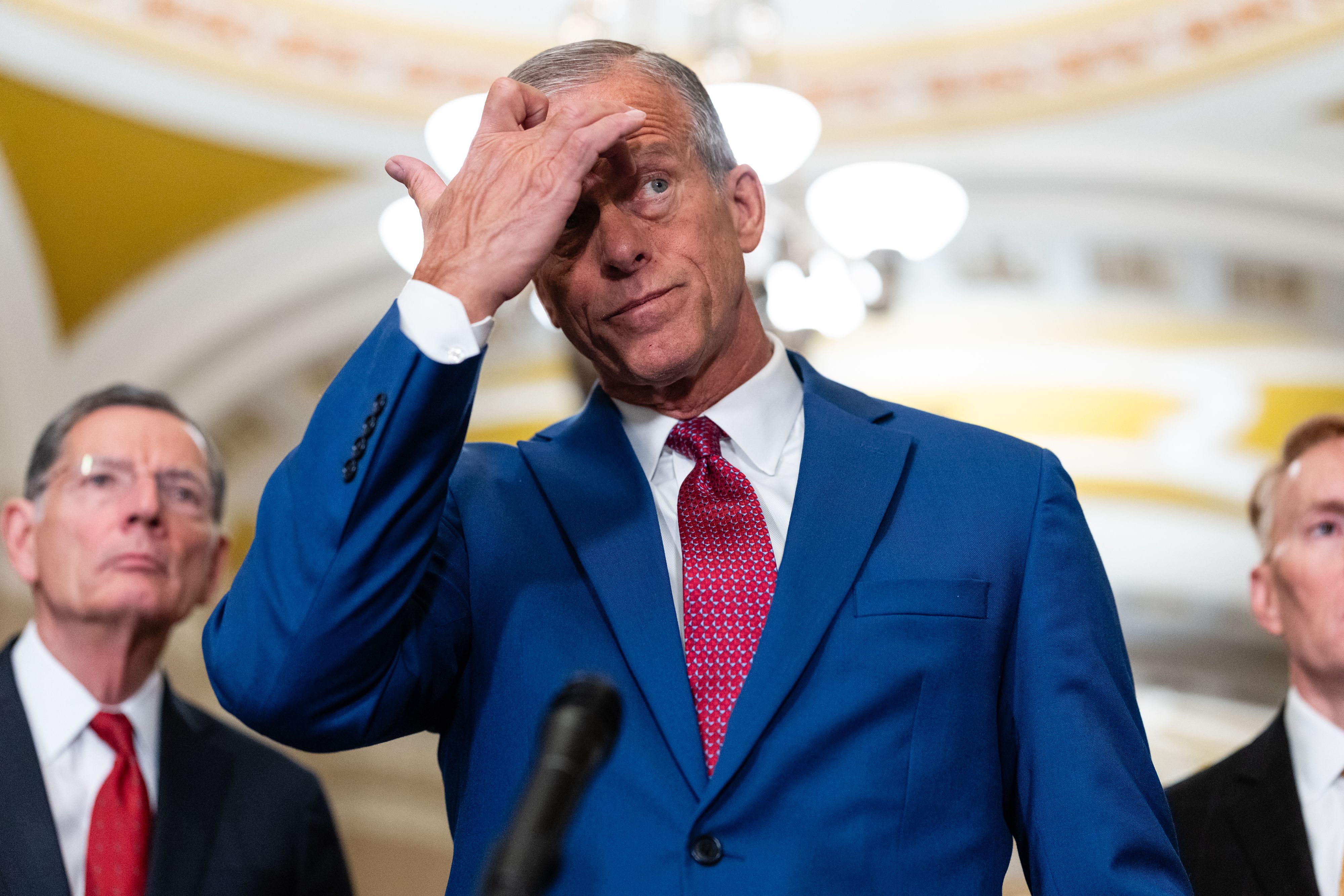 Senate Majority Leader John Thune (R-S.D.) speaks to reporters in the Capitol last month.
