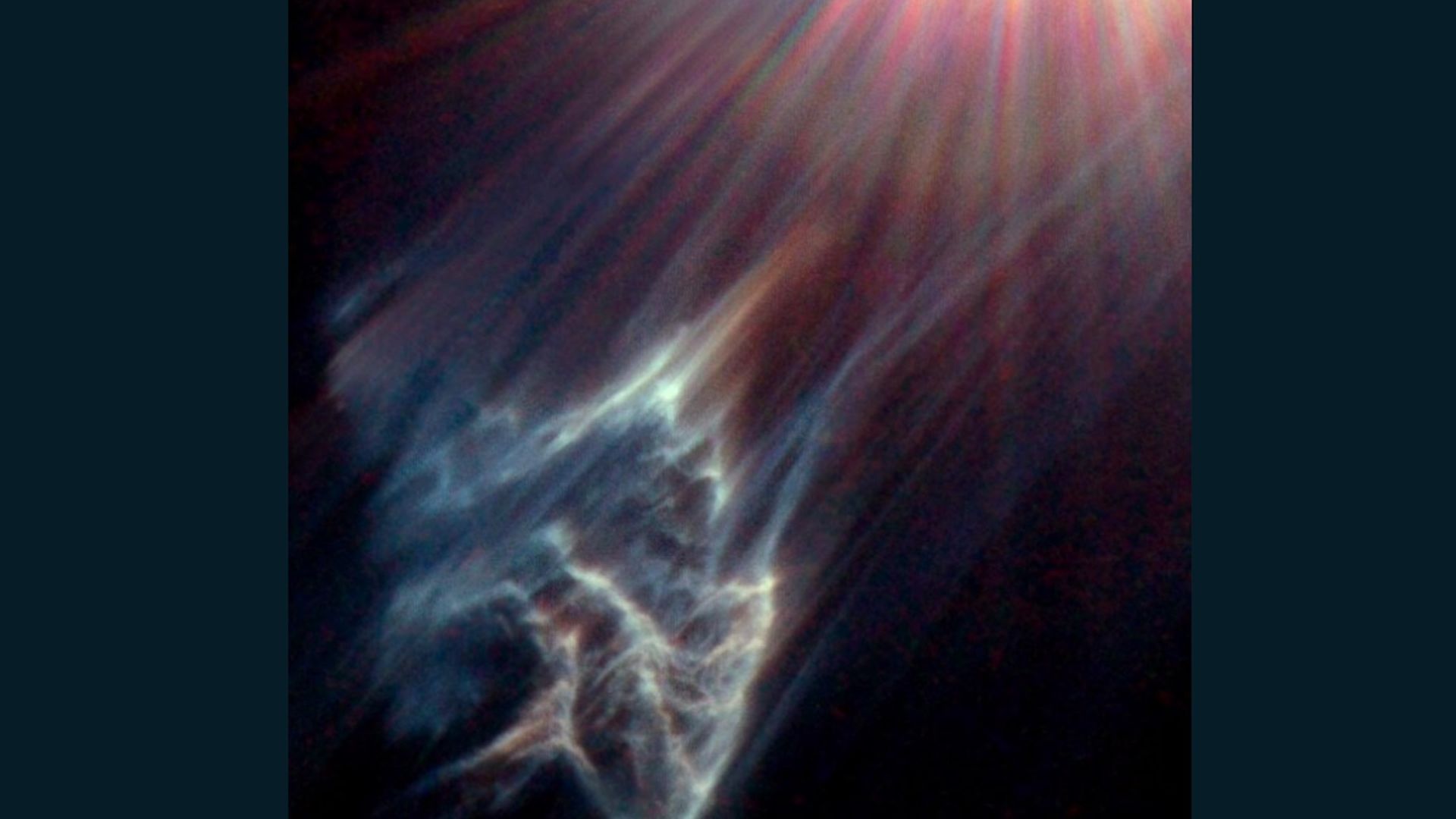 The wisps of an interstellar cloud being ripped apart by a star