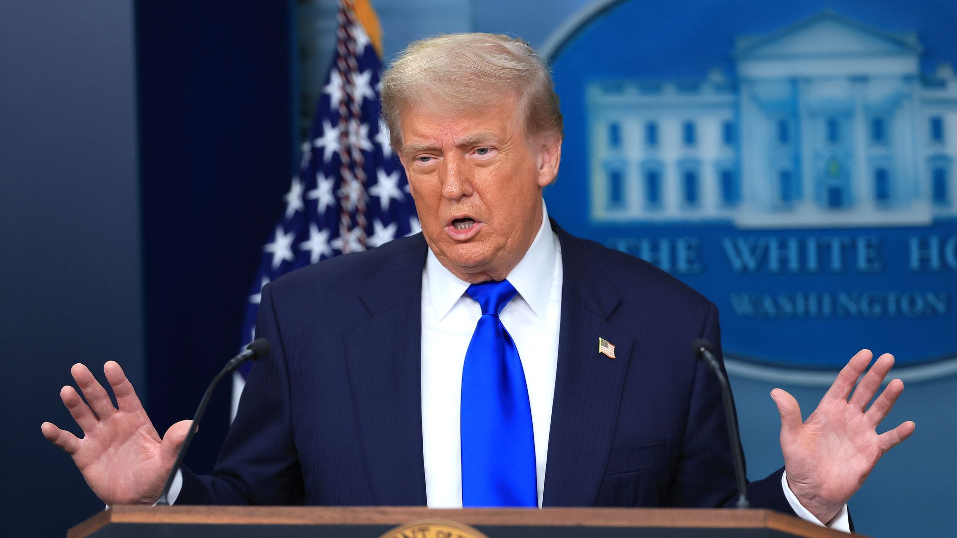 President Trump addresses reporters at the White House.