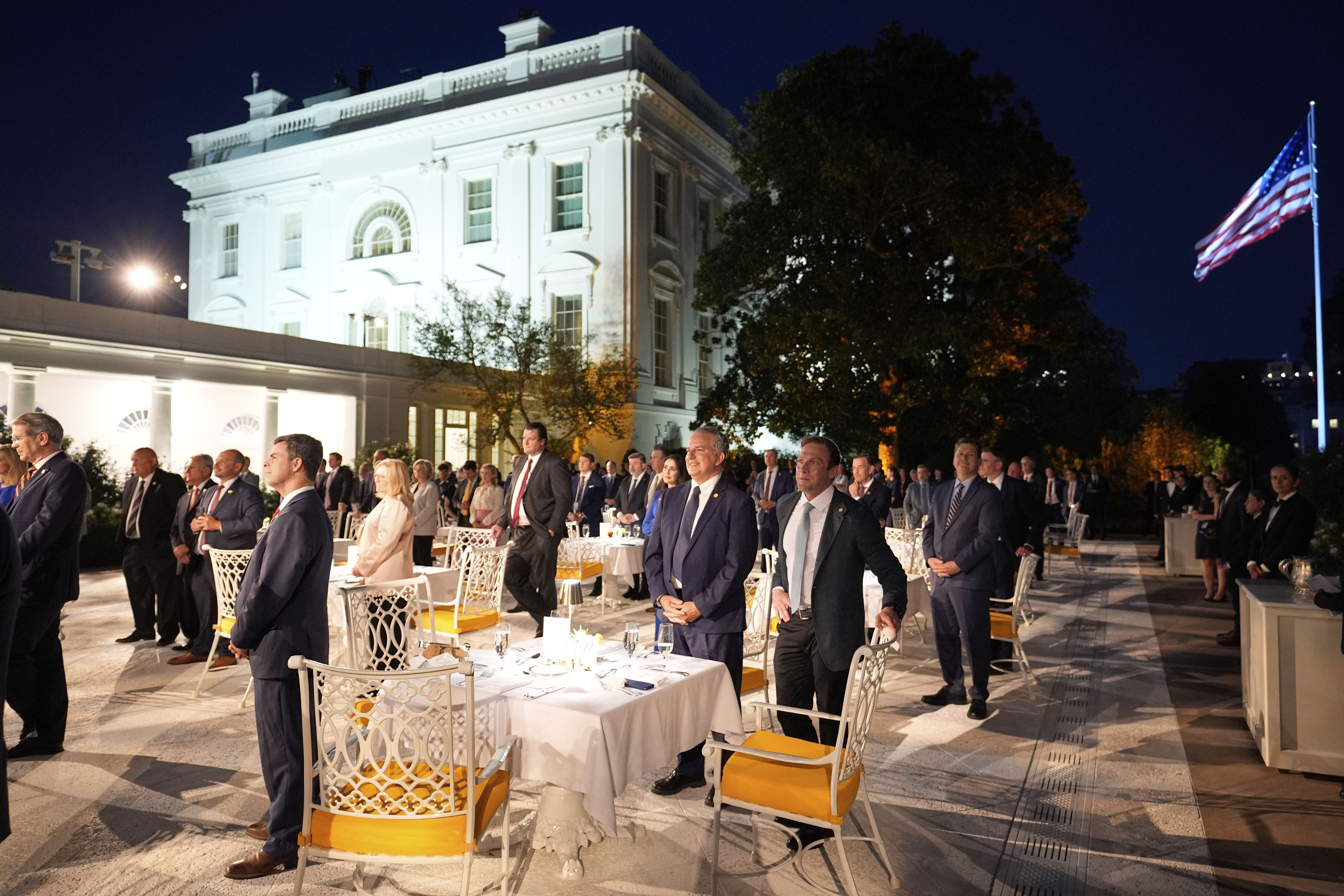 Members of Congress listen as President Donald Trump speaks at a dinner in the Rose Garden of the White House, Friday, Sept. 5, 2025, in Washington. (AP Photo/Alex Brandon)