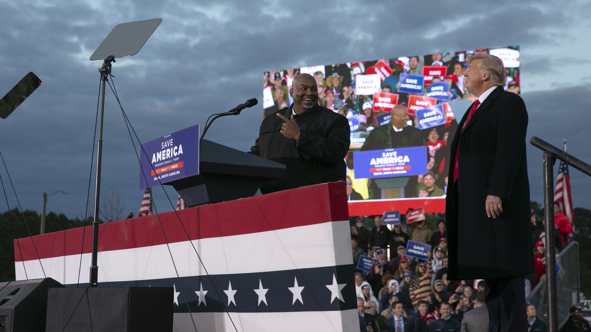 Lt. Gov. Mark Robinson joins the stage with former U.S. President Donald Trump during a rally at The Farm at 95 on April 9, 2022 in Selma, North Carolina. The rally comes about five weeks before North Carolinas primary elections where Trump has thrown his support behind candidates in some key Republ