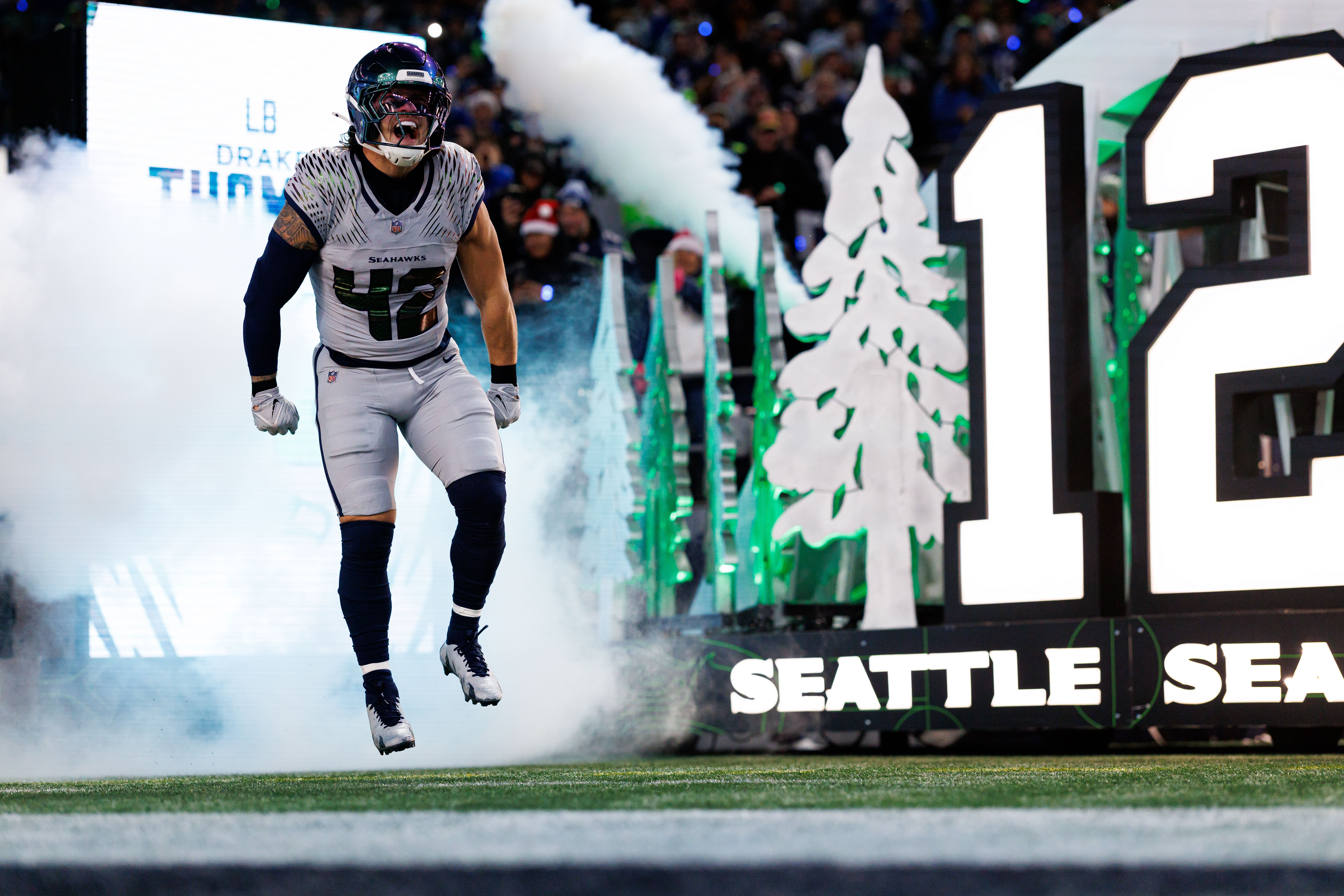 Drake Thomas #42 of the Seattle Seahawks enters the field during player introductions prior to the NFL football game against the Los Angeles Rams at Lumen Field on December 18, 2025 in Seattle, Washington. (Photo by Brooke Sutton/Getty Images)