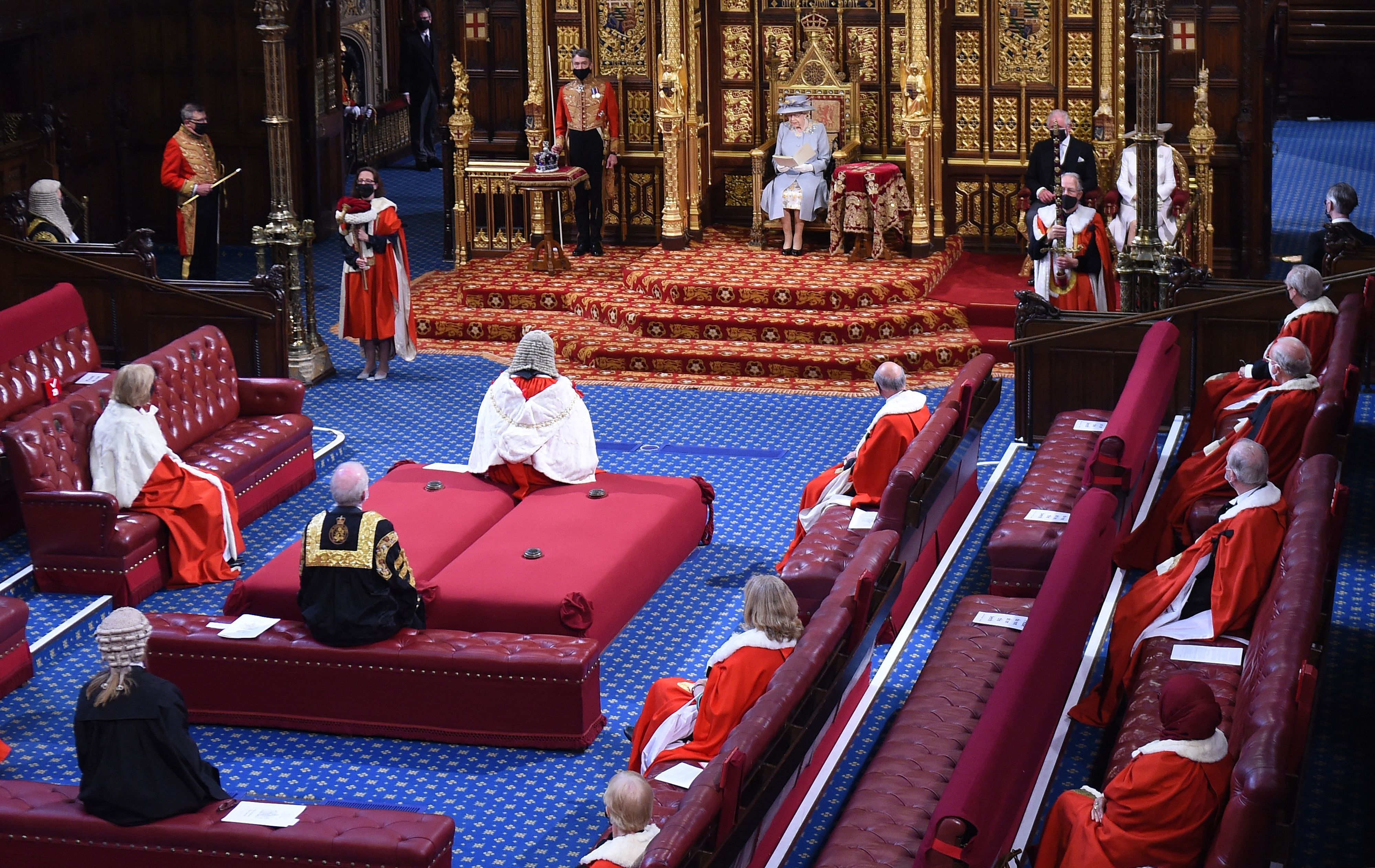 The queen giving a speech before parliament.