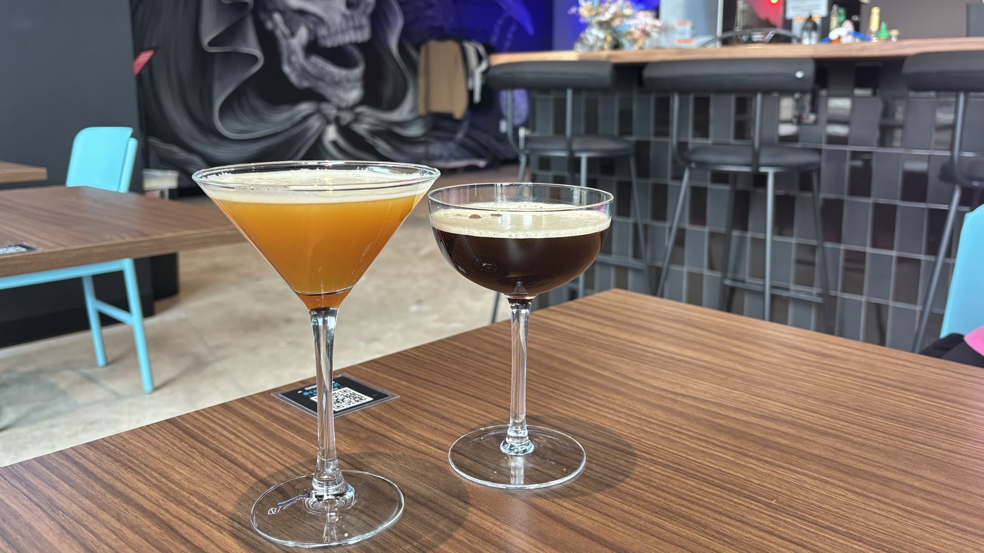 Two drinks on a table. 