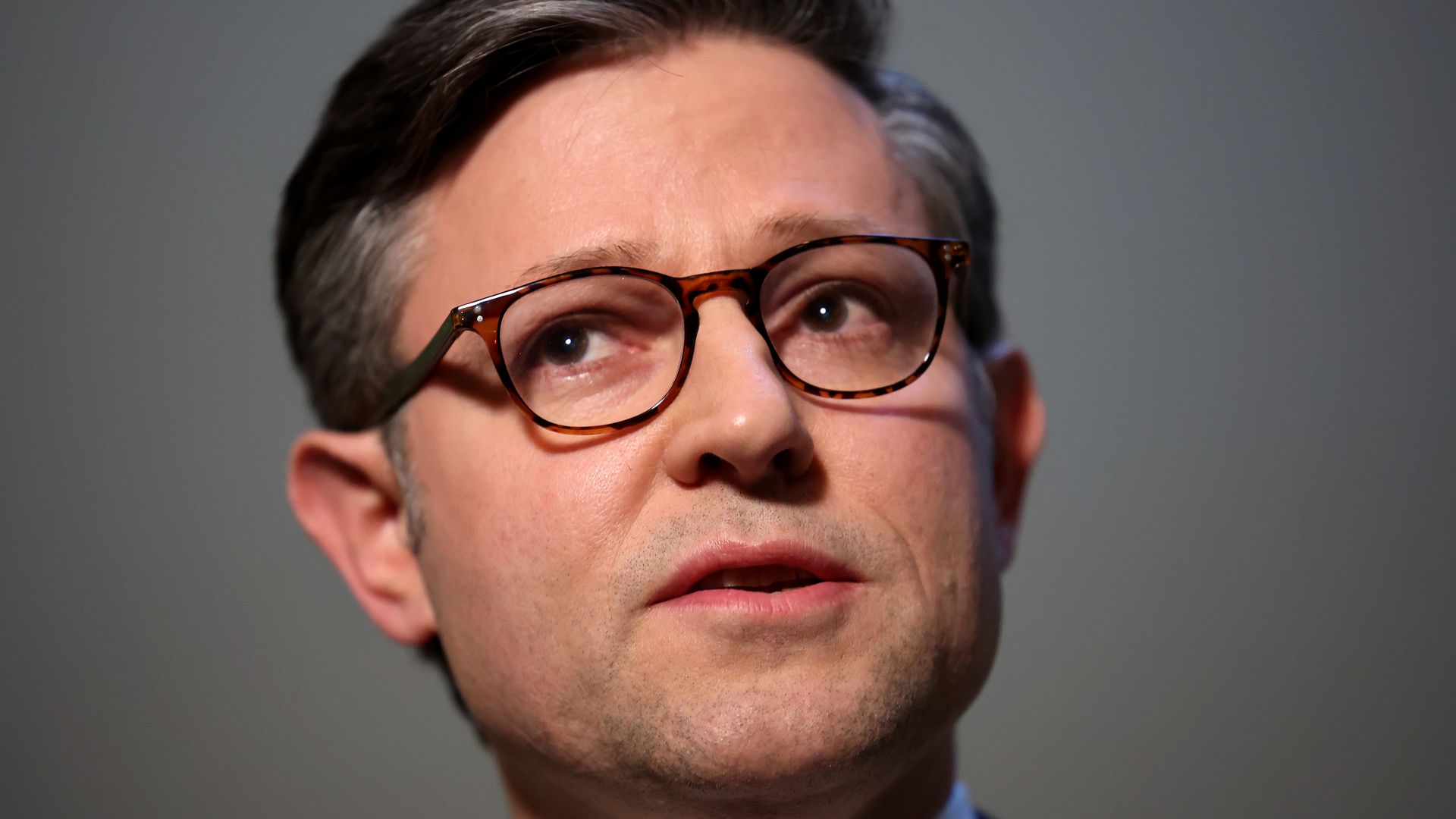 Speaker Mike Johnson, wearing tortoise shell glasses.