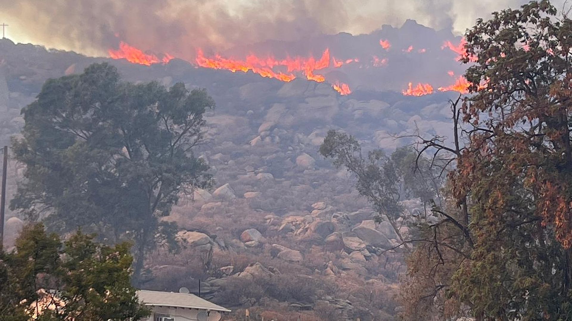 A photo of the Mill Fire that's killed at least 2 people in California as of Monday evening.