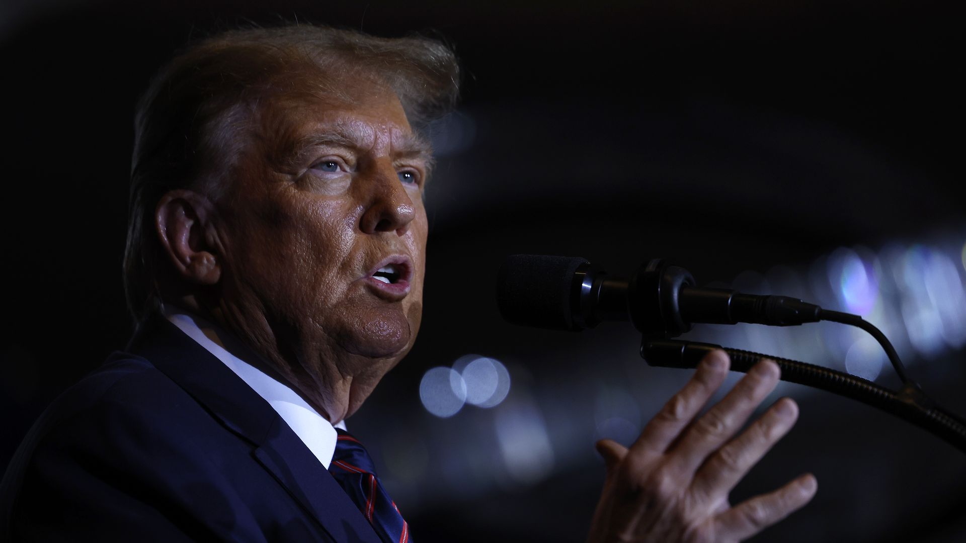 NASHUA, NEW HAMPSHIRE - JANUARY 23: Republican presidential candidate and former U.S. President Donald Trump delivers remarks during his primary night rally at the Sheraton on January 23, 2024 in Nashua, New Hampshire